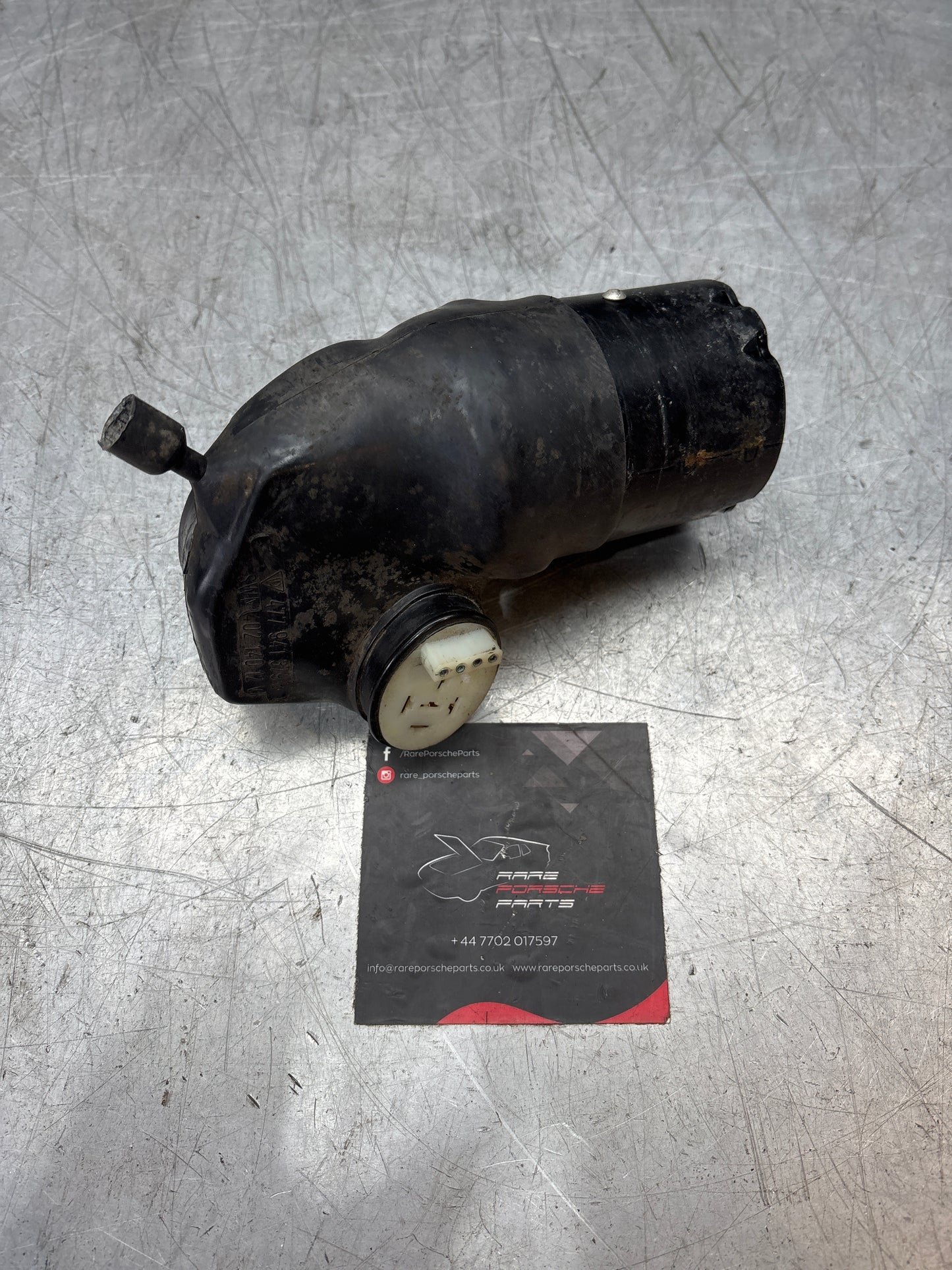 Porsche 924/944 headlight lift motor 477941379B, used