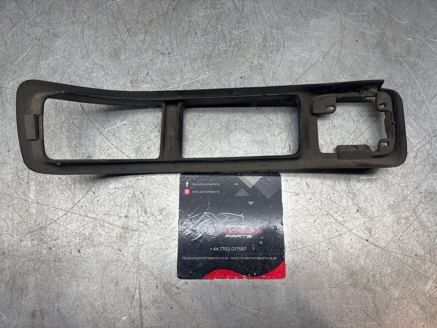 Porsche 944 Front Left Bumper Light Frame, bezel Trim 93150519501 used, cracked