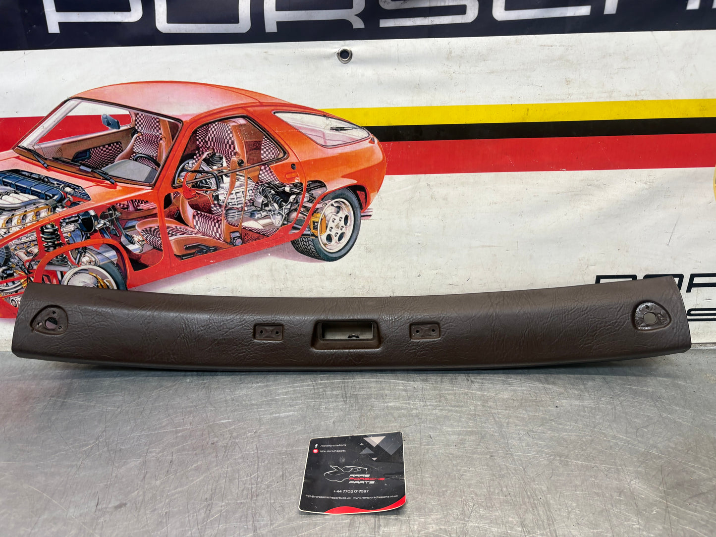 Porsche 924 944 -85.5 front roof / sun visor trim, brown 477867511, used