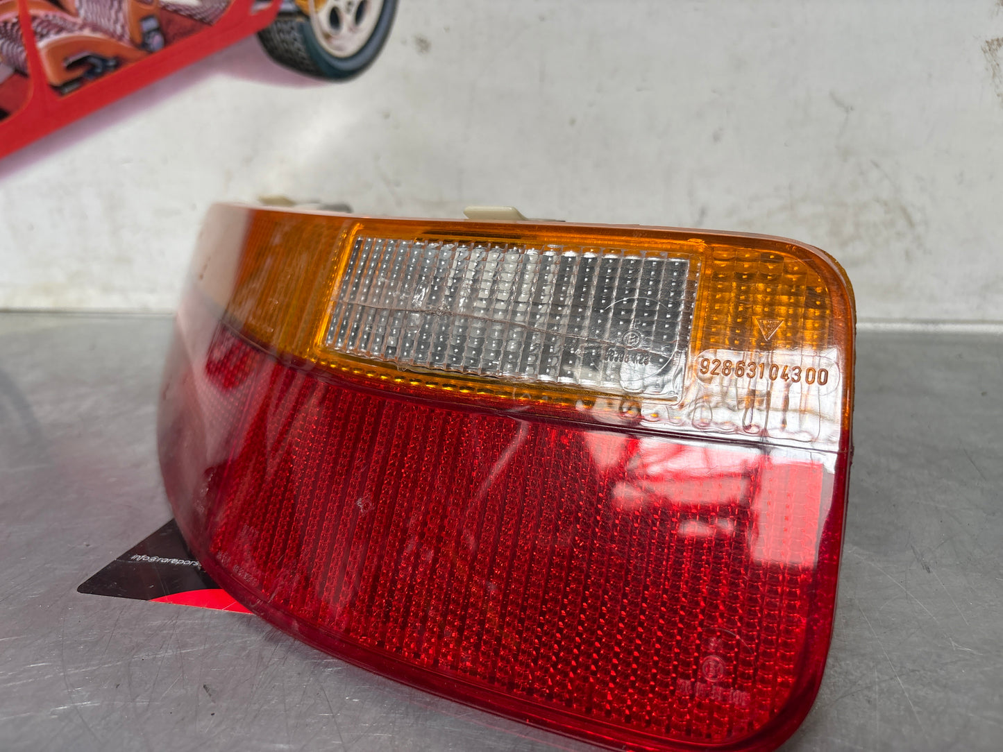 Porsche 928 rear left tail light, used, 92863104301
