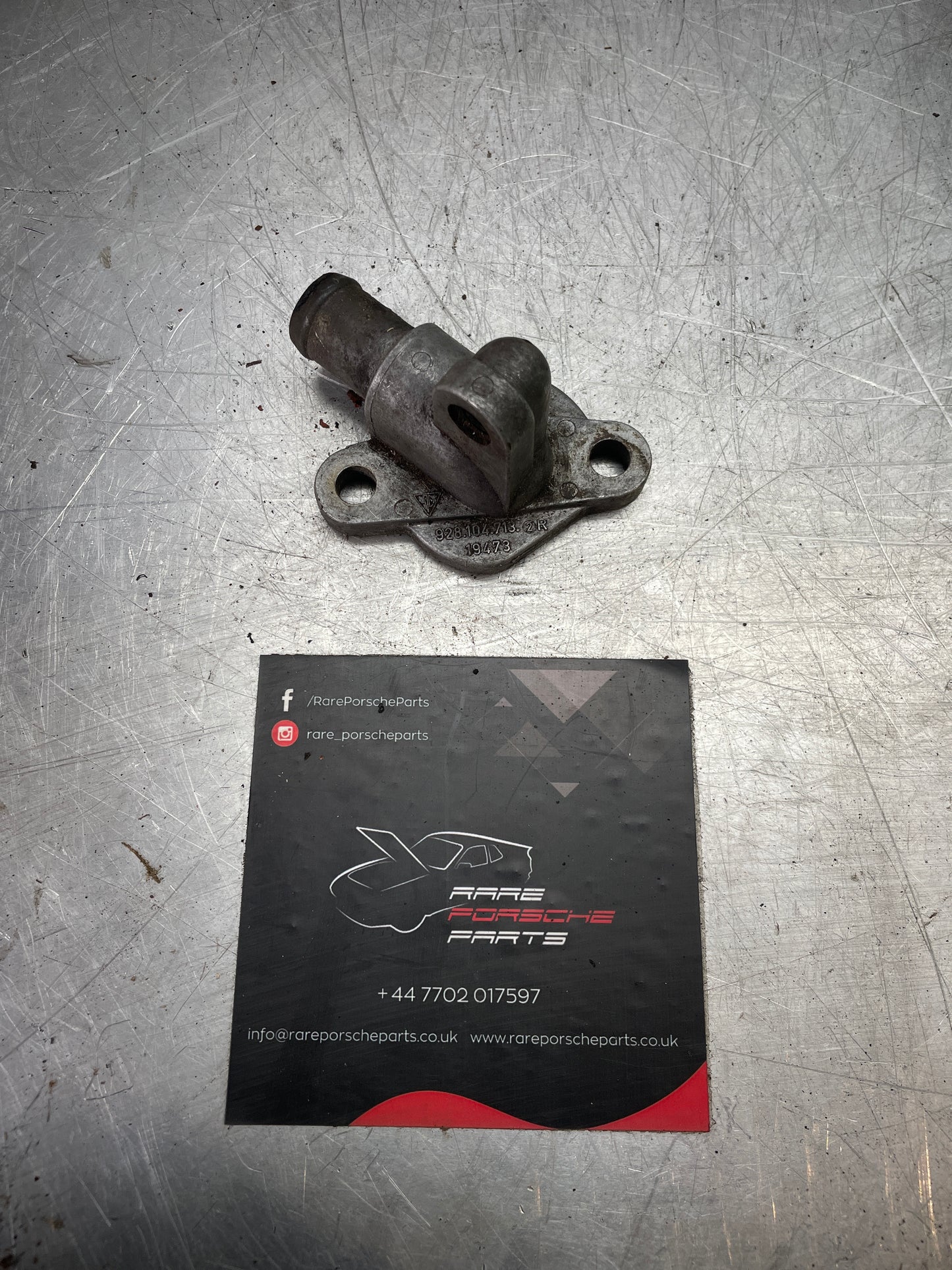 Porsche 928 S4 connection piece, used 9281047132R