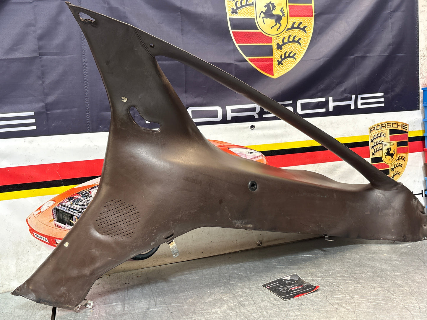Porsche 928 early right side lower side trim panel, without loudspeaker, brown used 92855502202