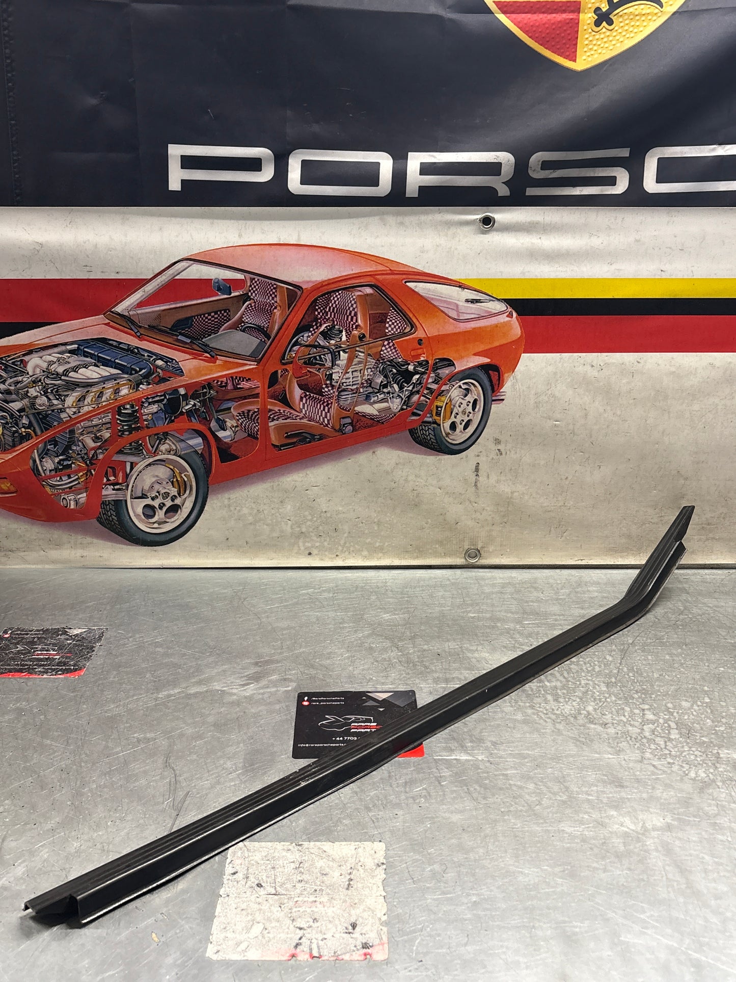 Porsche early 924/944 left sill trim, used 477853657A