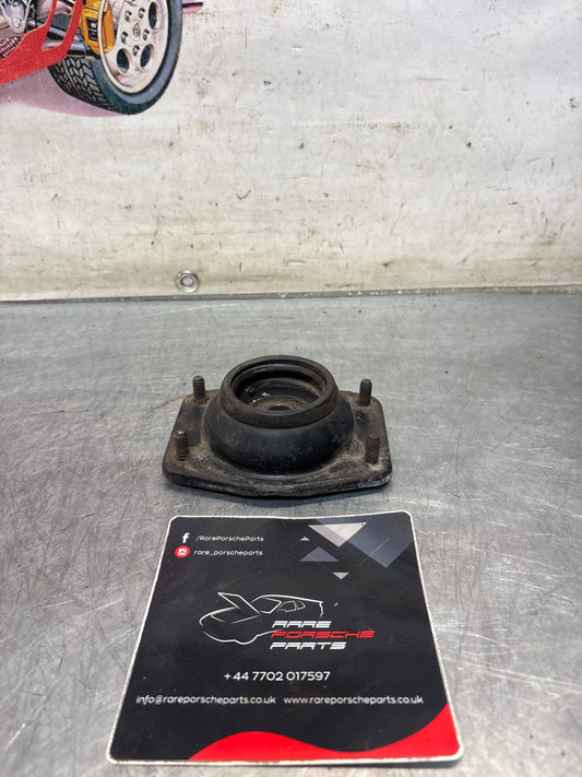 Porsche 924 / 944 front suspension bearing flange, 477412345, used