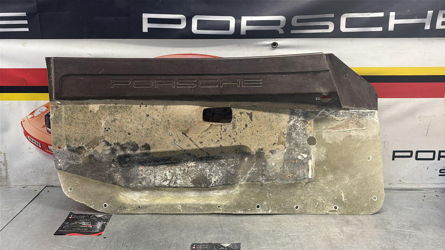 Porsche 924 / 944 early left manual Used door card, Porsche scripted brown, 477867011 no fabric!