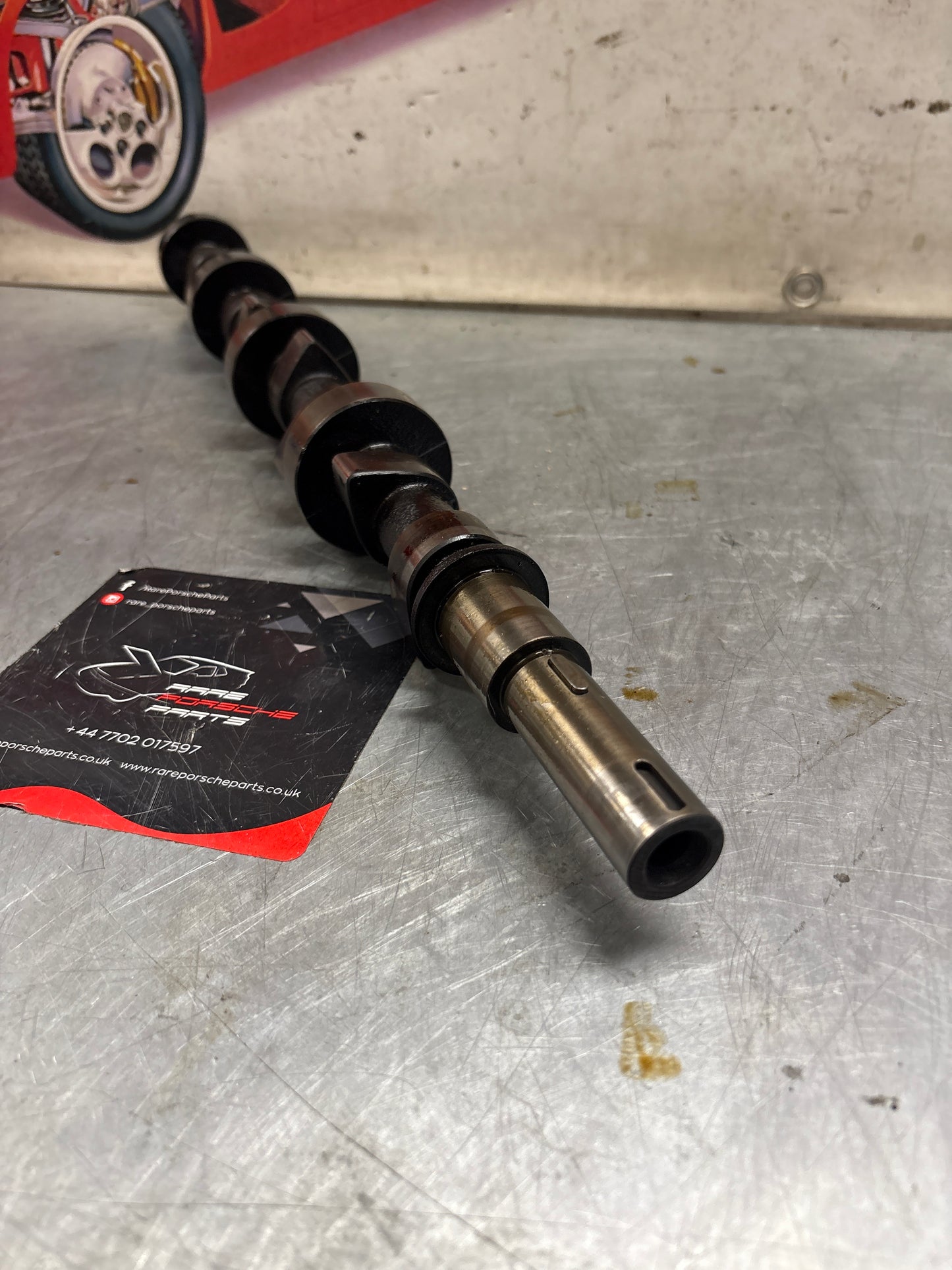 Porsche 928 cam shaft, used 9281052040R