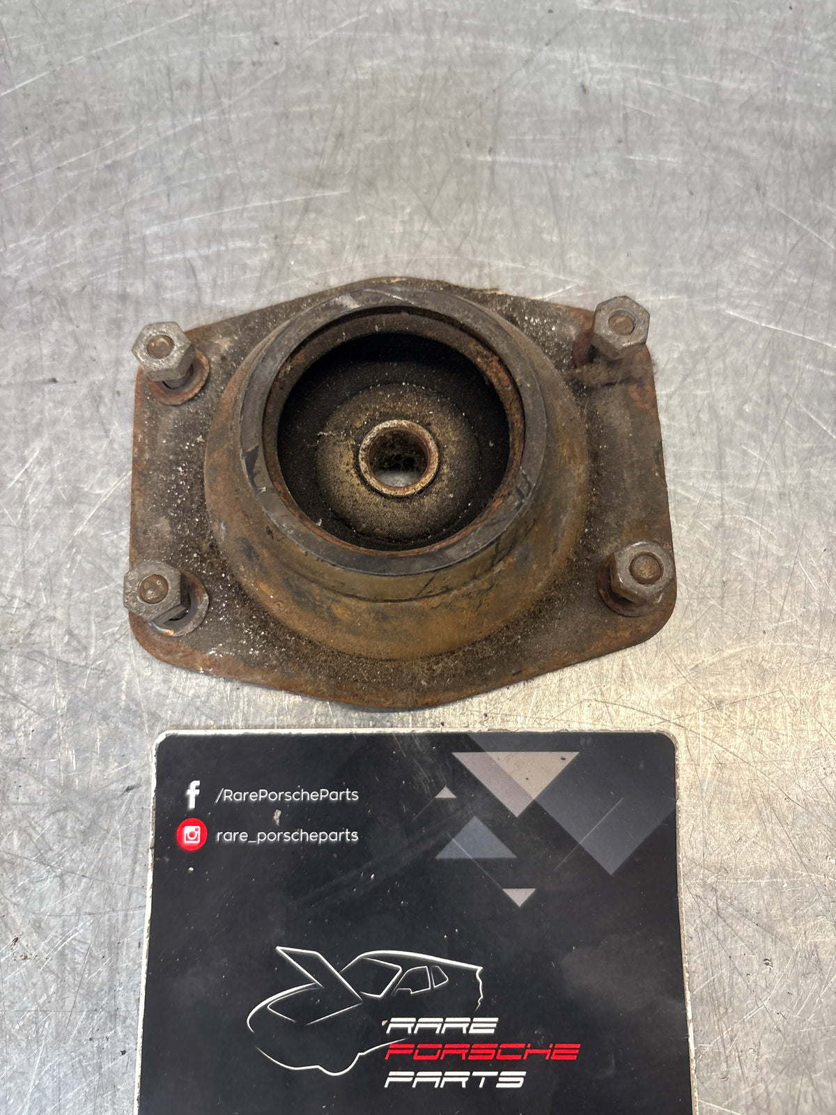 Porsche 924 / 944 front suspension bearing flange, 477412345, used