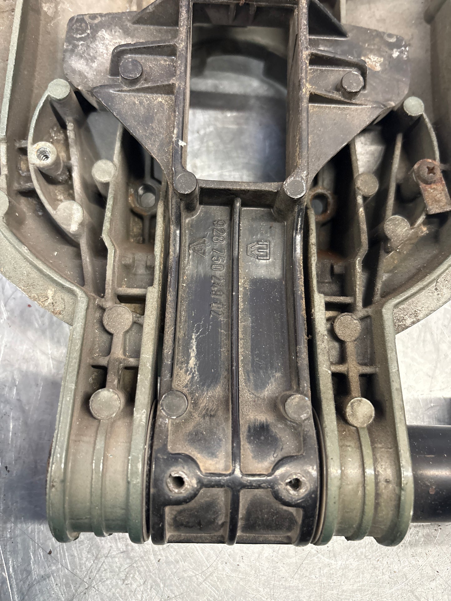 Porsche 928 right headlight swivel frame 92875024902 92875024302 used