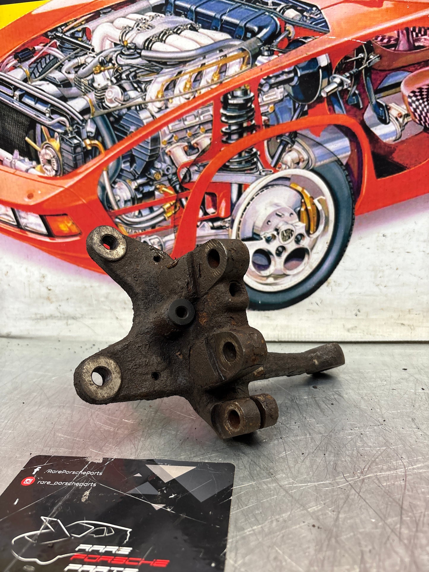 Porsche 924 76-78 Front left Spindle, knuckle, 477407311G, used