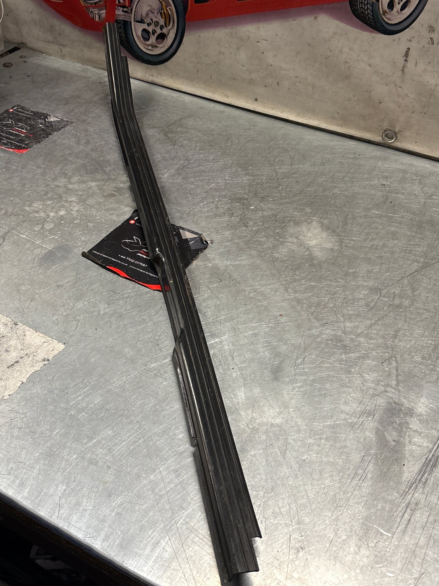 Porsche 944 85.5- left sill trim, scuff plate used 94455112100 cracked