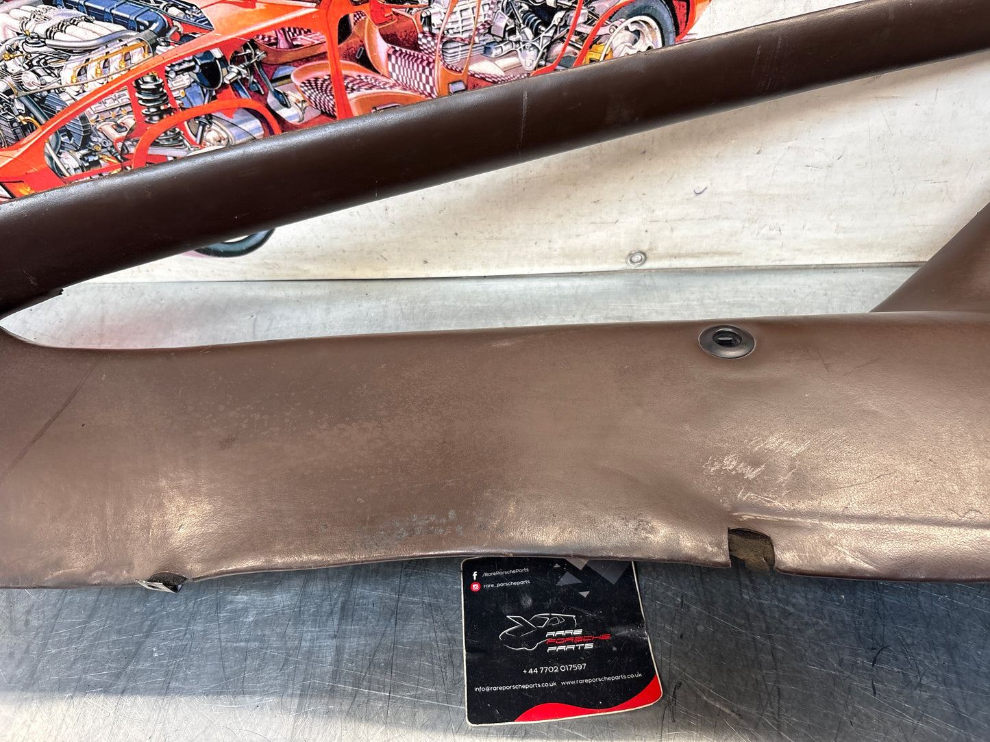 Porsche 928 early left side lower side trim panel, without loudspeaker, brown used 92855502102