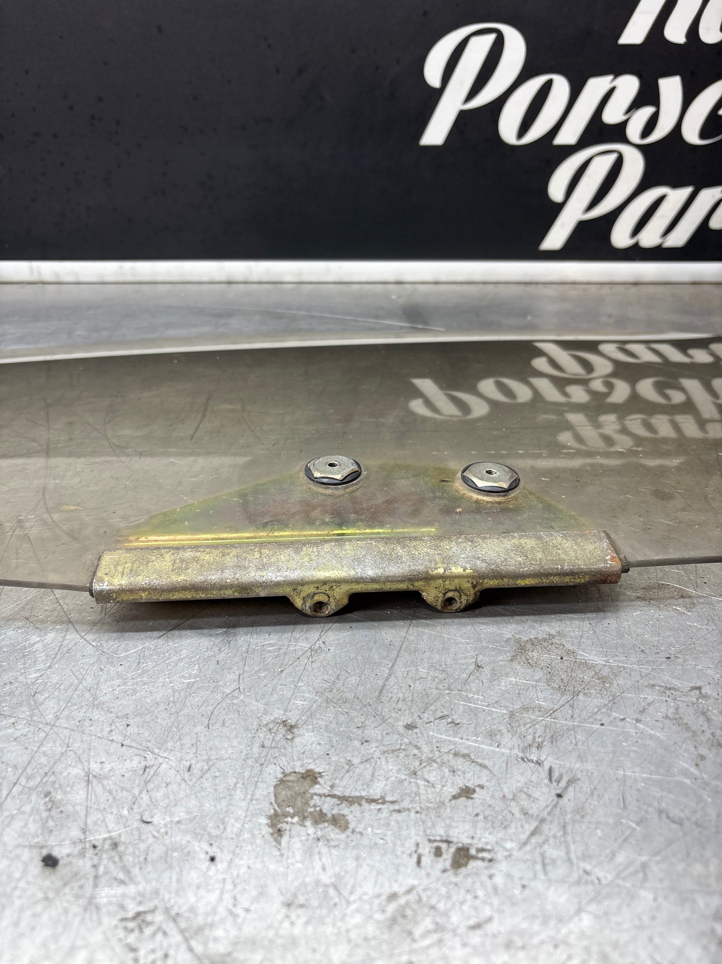 Porsche 928 left side door window glass, brown tinted 92853701502 used