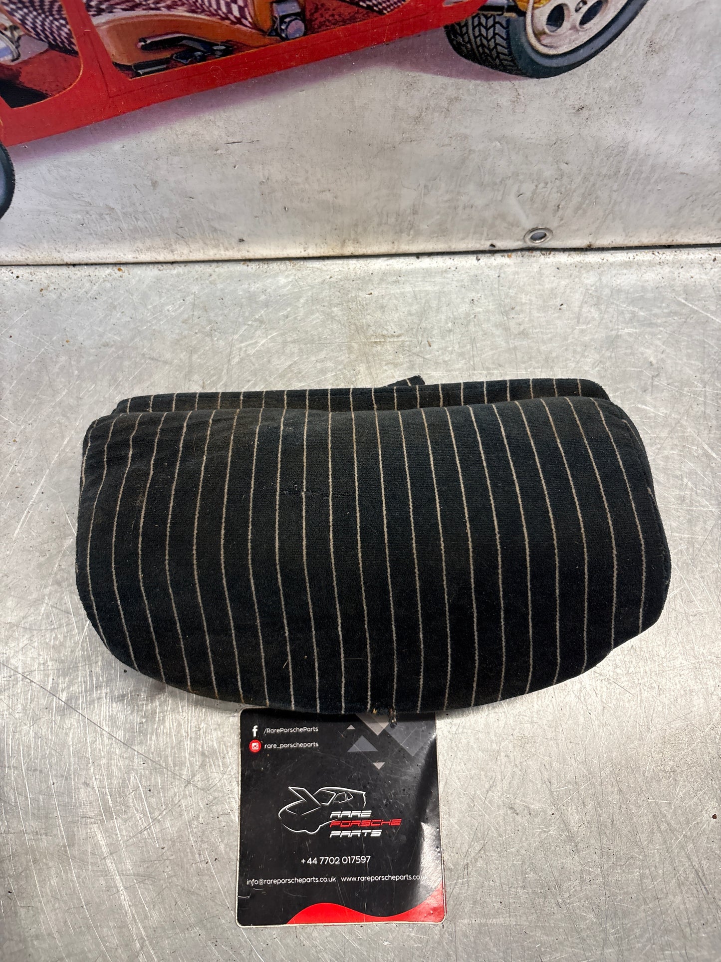 Porsche 928 rear left seat centre cushion,black pinstripe, carpeted, used 92852208751