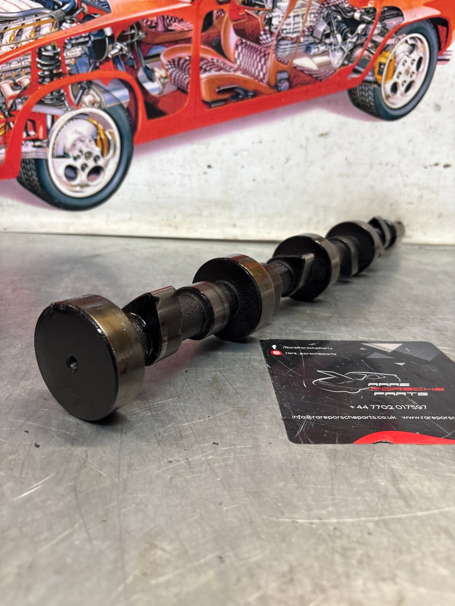 Porsche 928 cam shaft, used 9281052030R