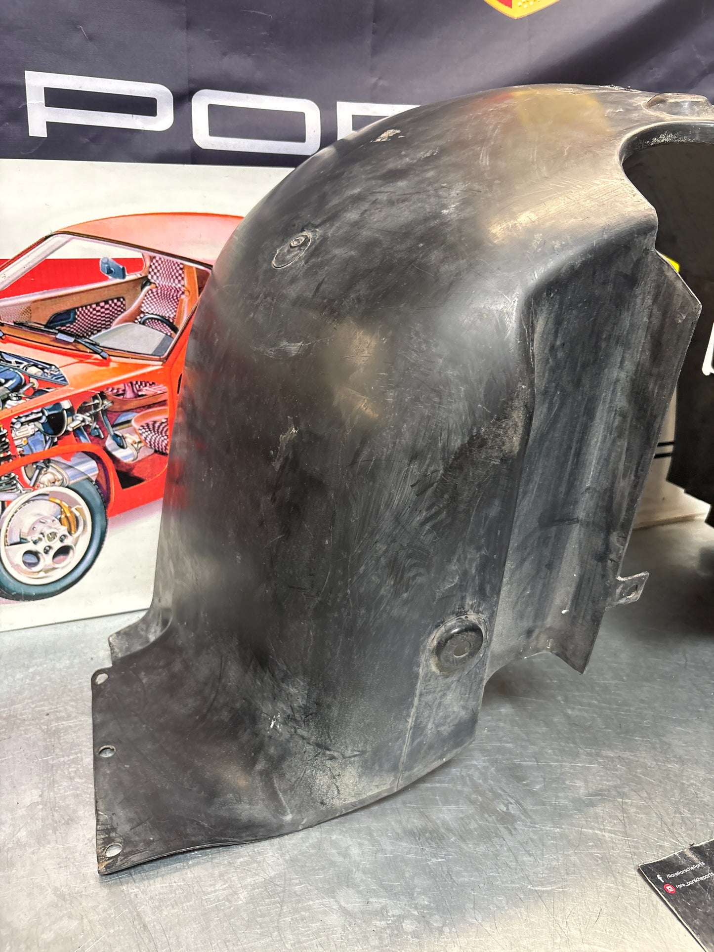 Porsche 944 from 85.5 wheel arch liner  Left, 94450438101 Used