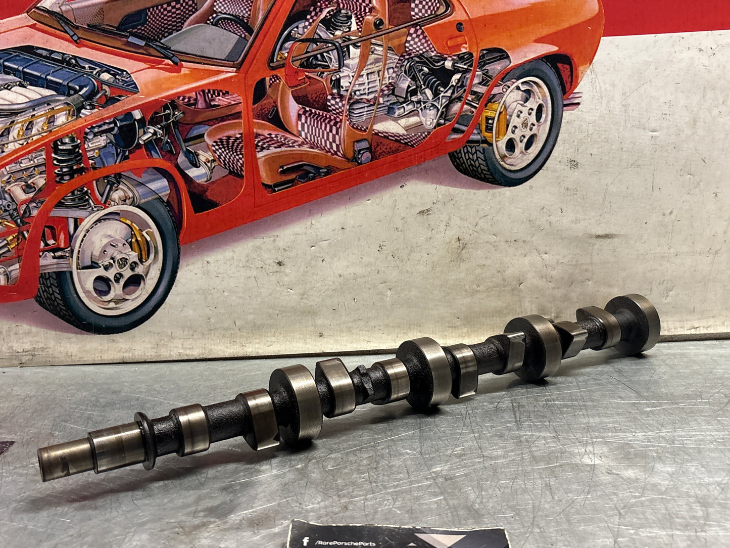 Porsche 924S 944 2.5 Cam shaft. Used. 94410515505R Part number is not visible