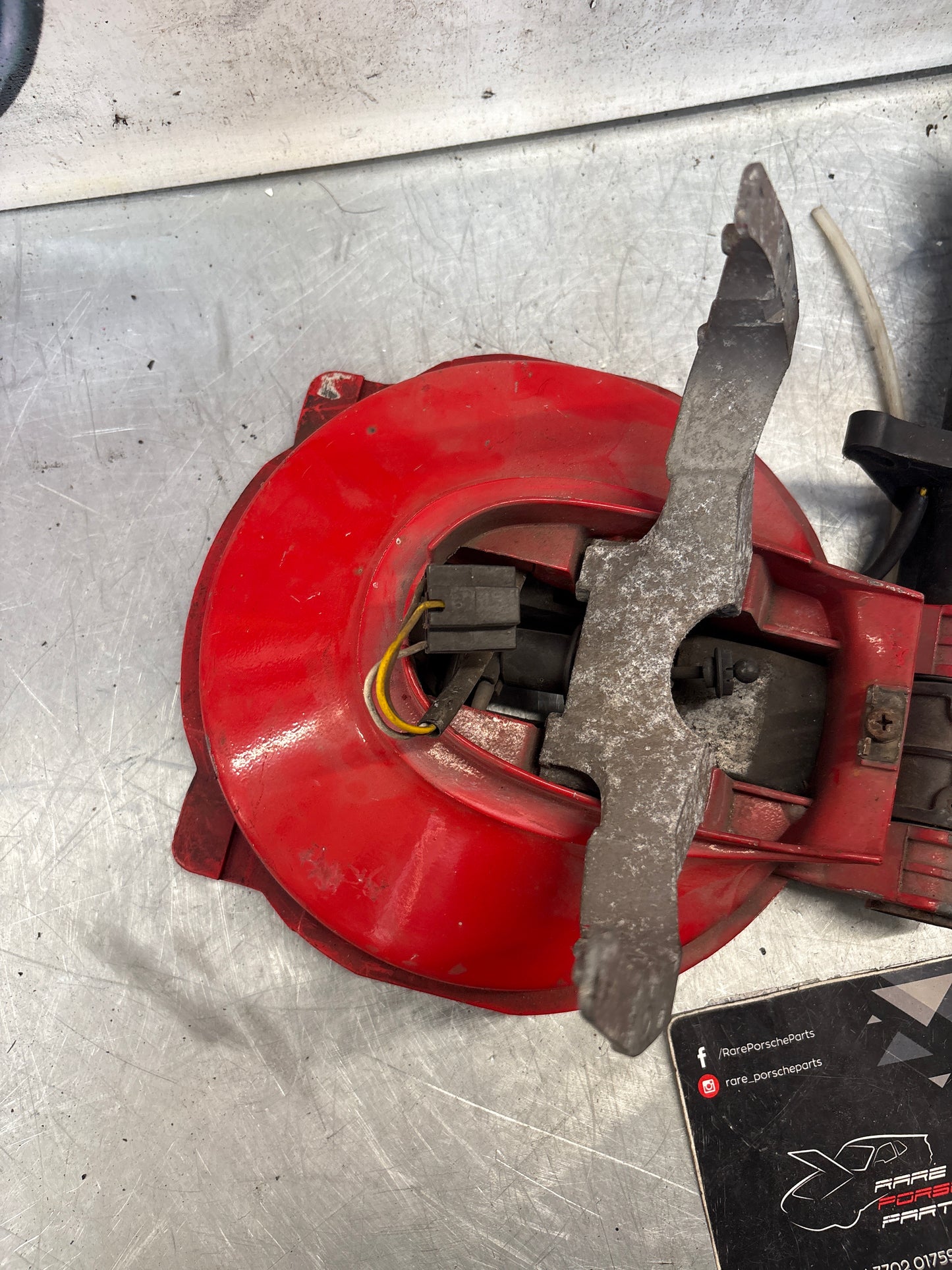 Porsche 928 left headlight swivel frame 92875024902 92875024302 used