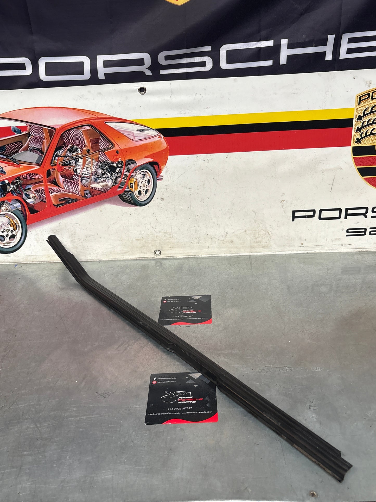 Porsche 944 85.5- left sill trim, scuff plate used 94455112100 cracked