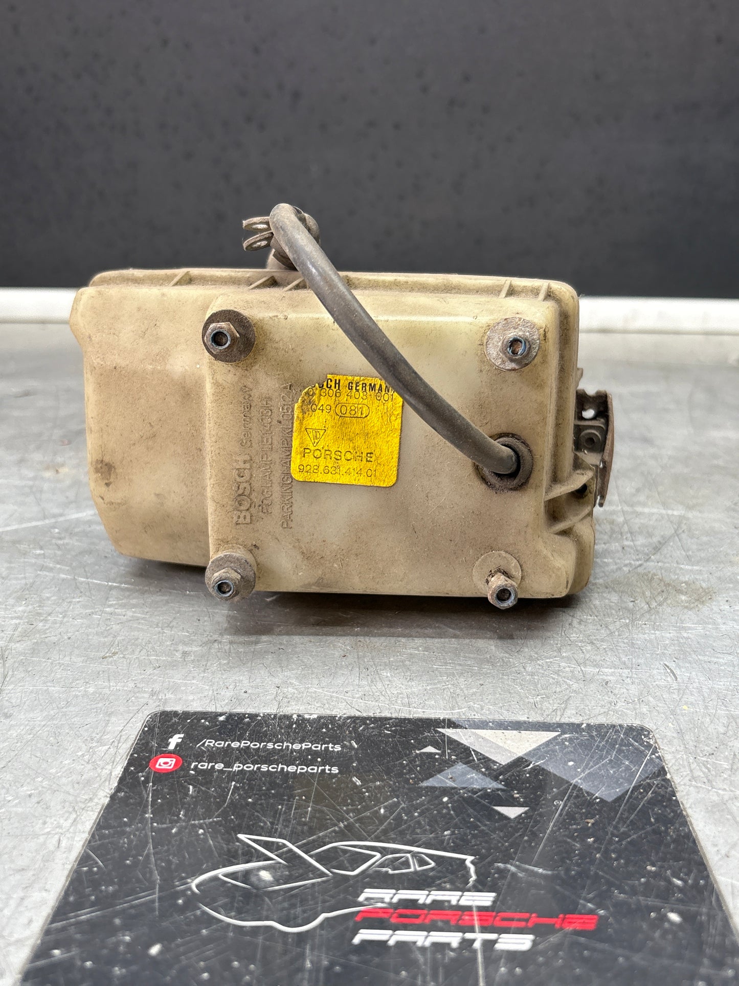 Porsche 928 Bosch headlight high beam, left 0306403001 / 92863141401