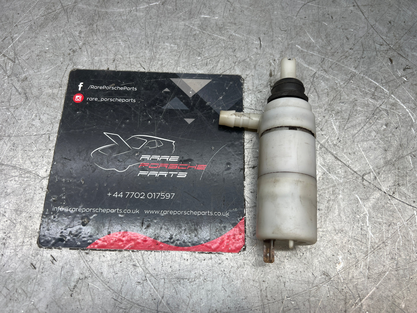 Porsche 924/944 Windscreen water bottle pump (used genuine) 357955681