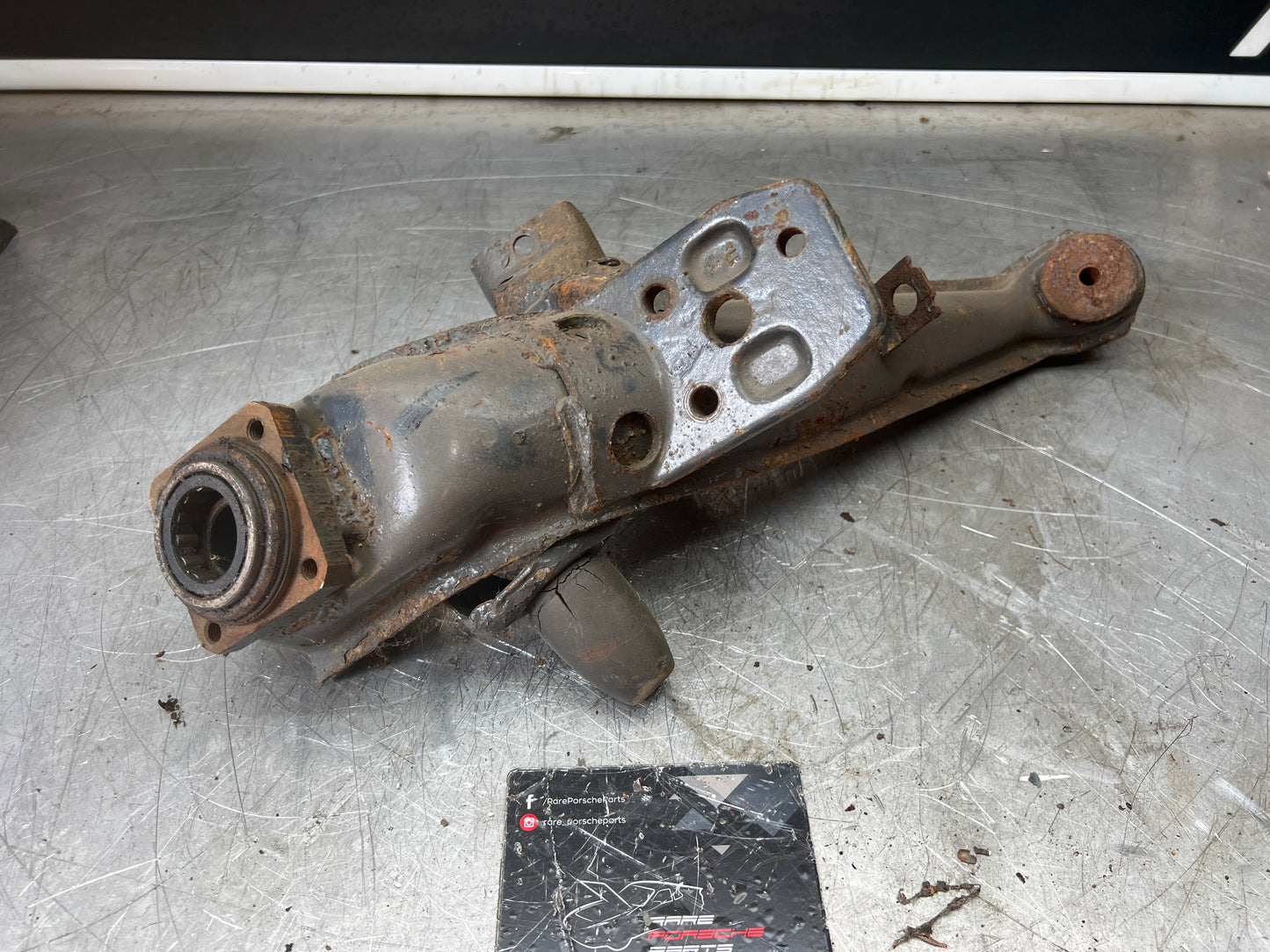 Porsche 924 944  -85.5 Rear left trailing arm, 94433102100