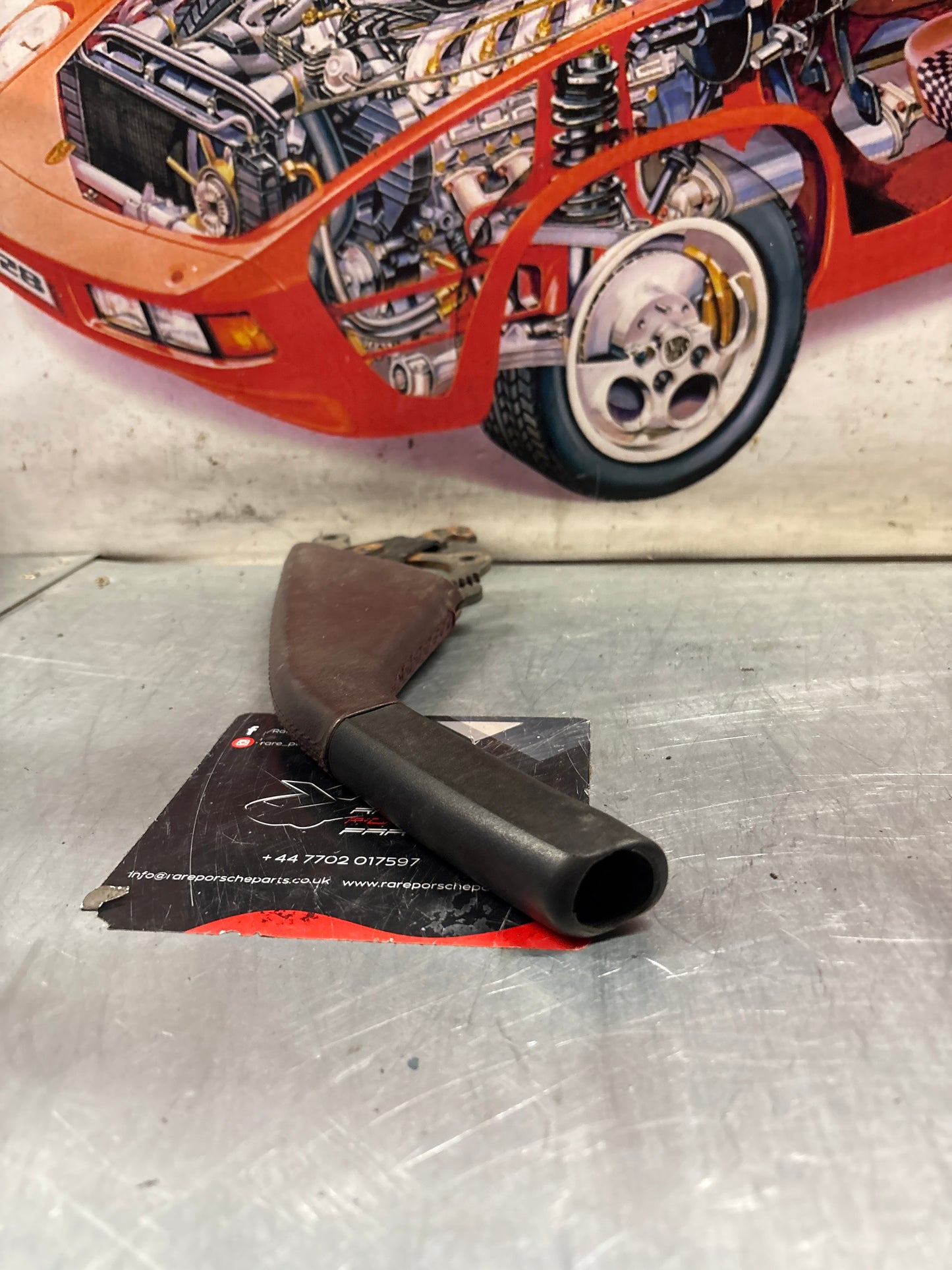 Porsche 944 handbrake lever from 85.5 burgundy, used 94442404900