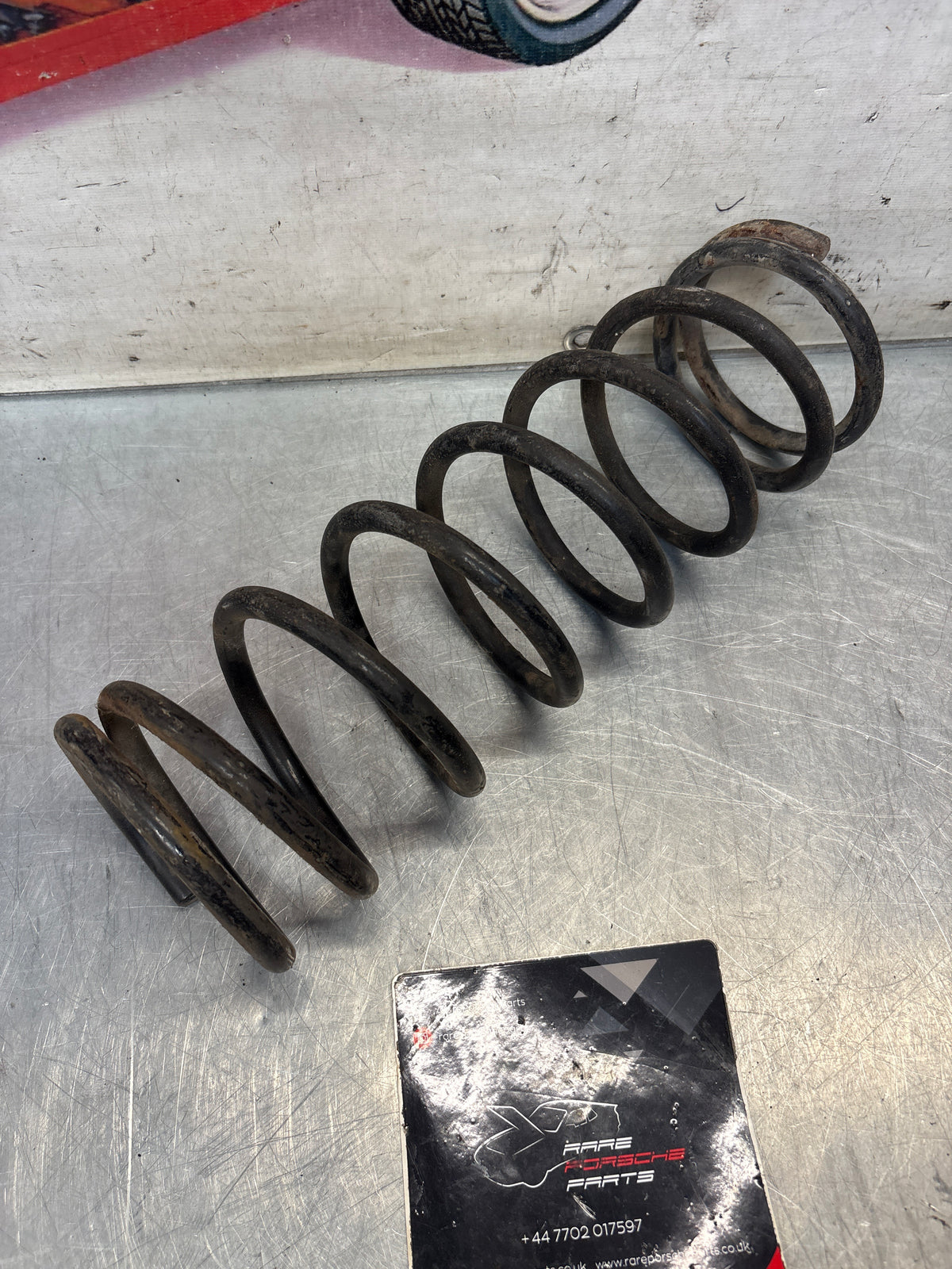 Porsche 924 coil spring, green, used 477411105M954