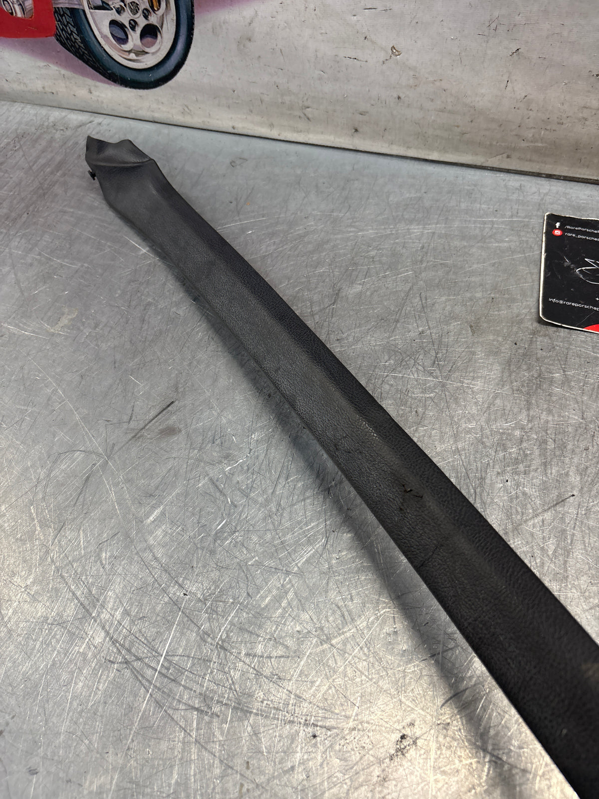 Porsche 928 tailgate trim, left, near side, black, 92855503702, used