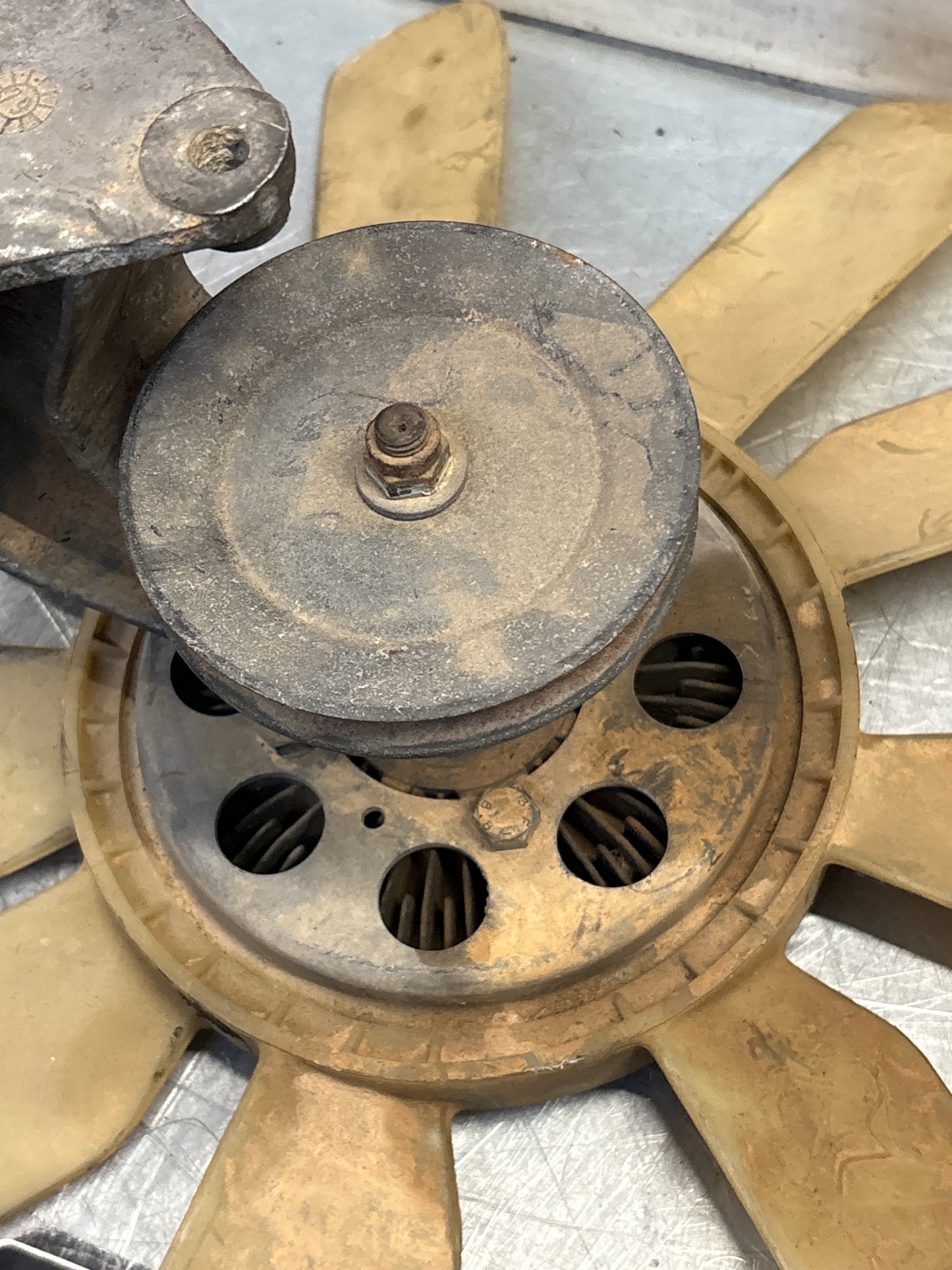 Porsche 928 late engine cooling fan clutch with bracket, used 92810611205 / 92810613701 / 9281061104R