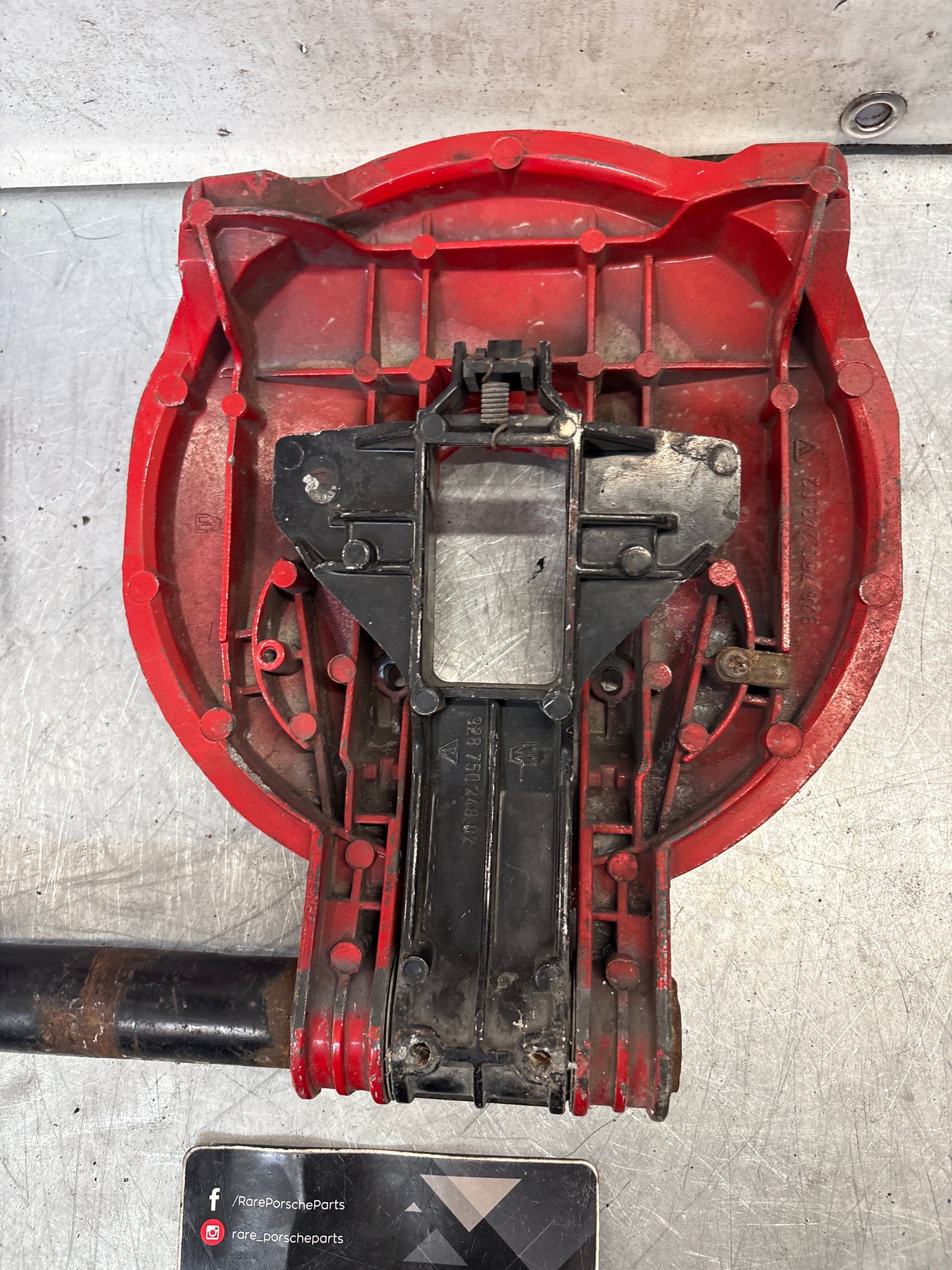 Porsche 928 left headlight swivel frame 92875024902 92875024302 used