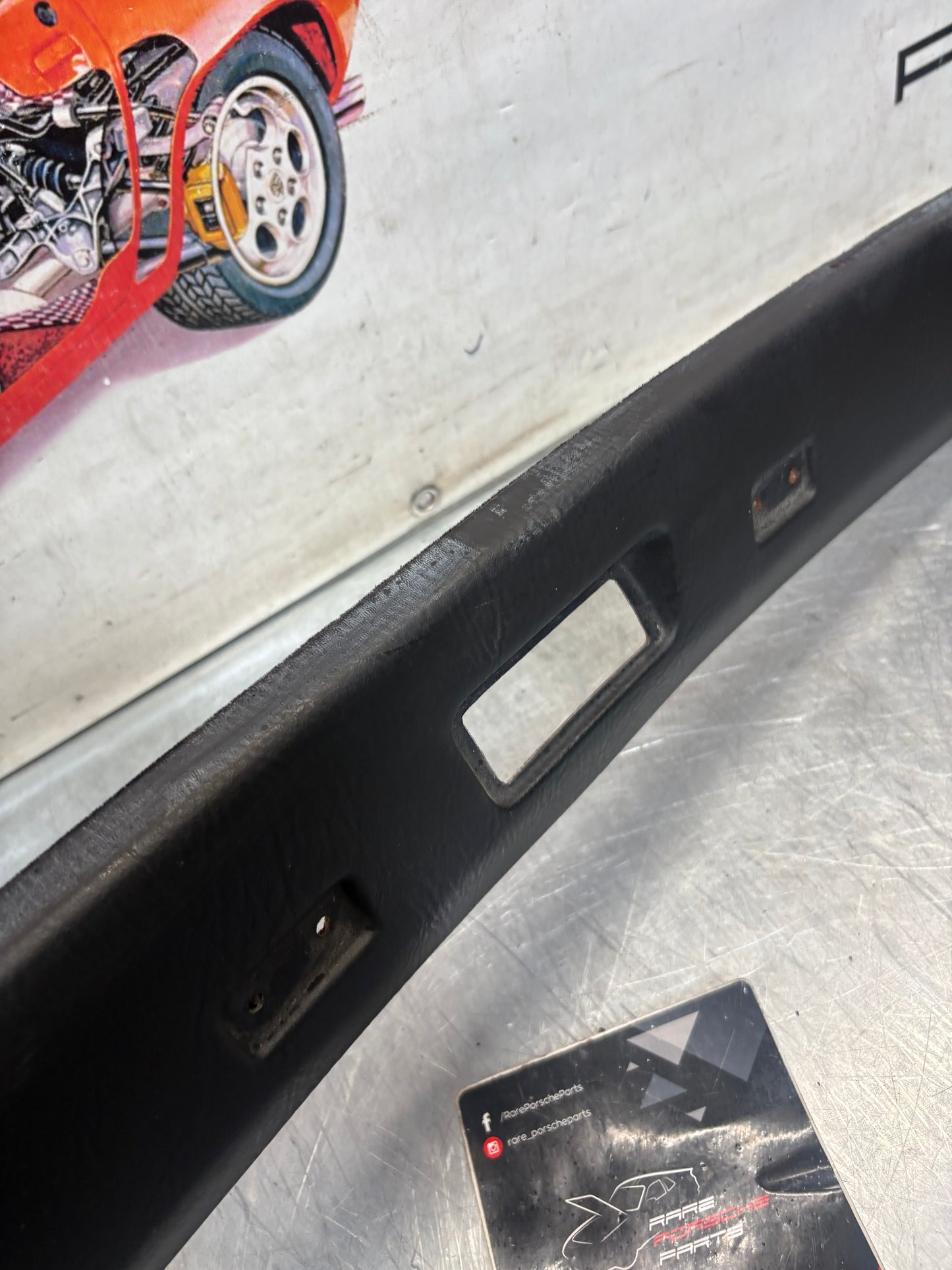 Porsche 924 944 -85.5 front roof / sun visor trim, black 477867511, used
