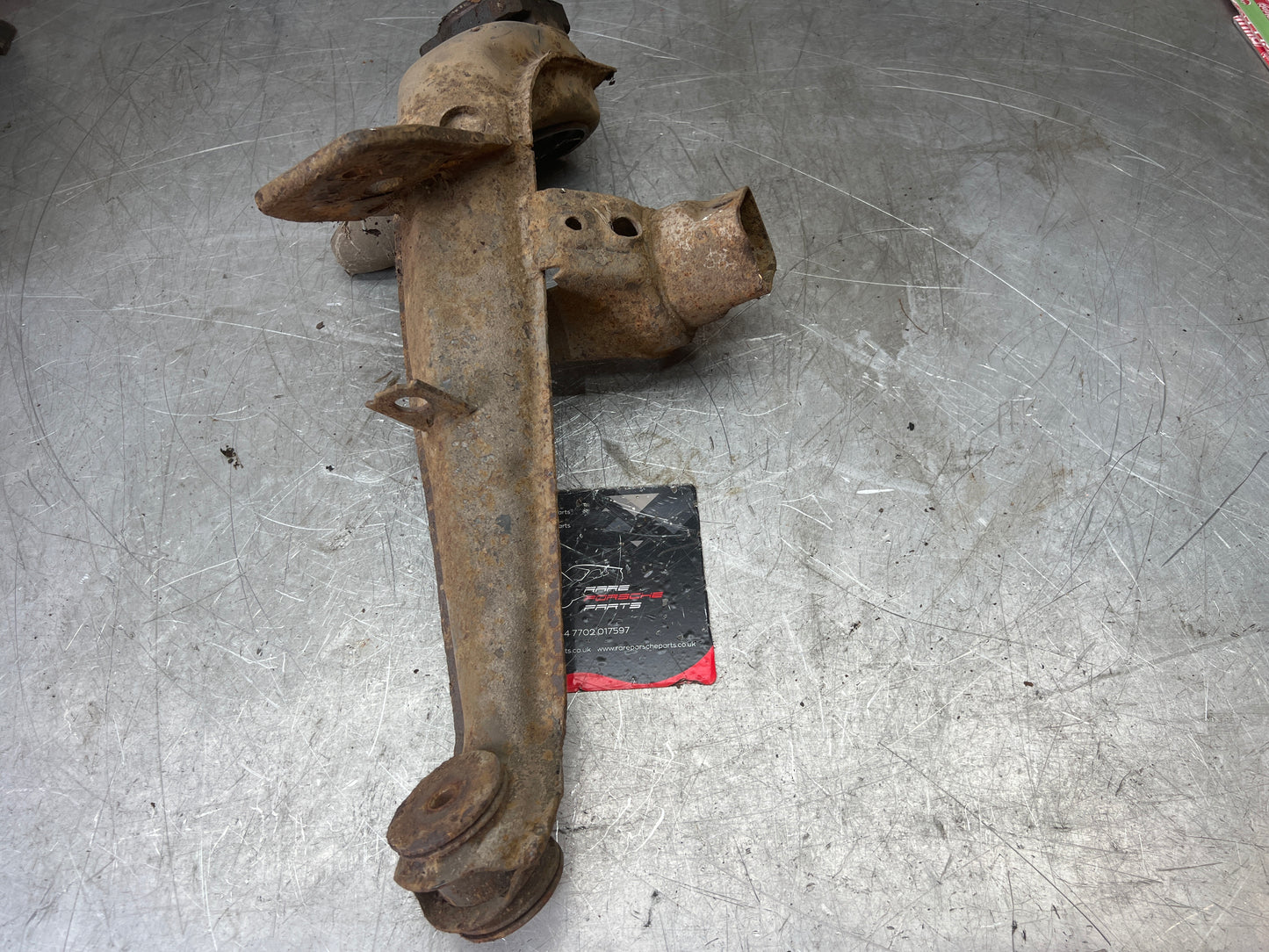 Porsche 924 944  -85.5 Rear left trailing arm, 94433102100