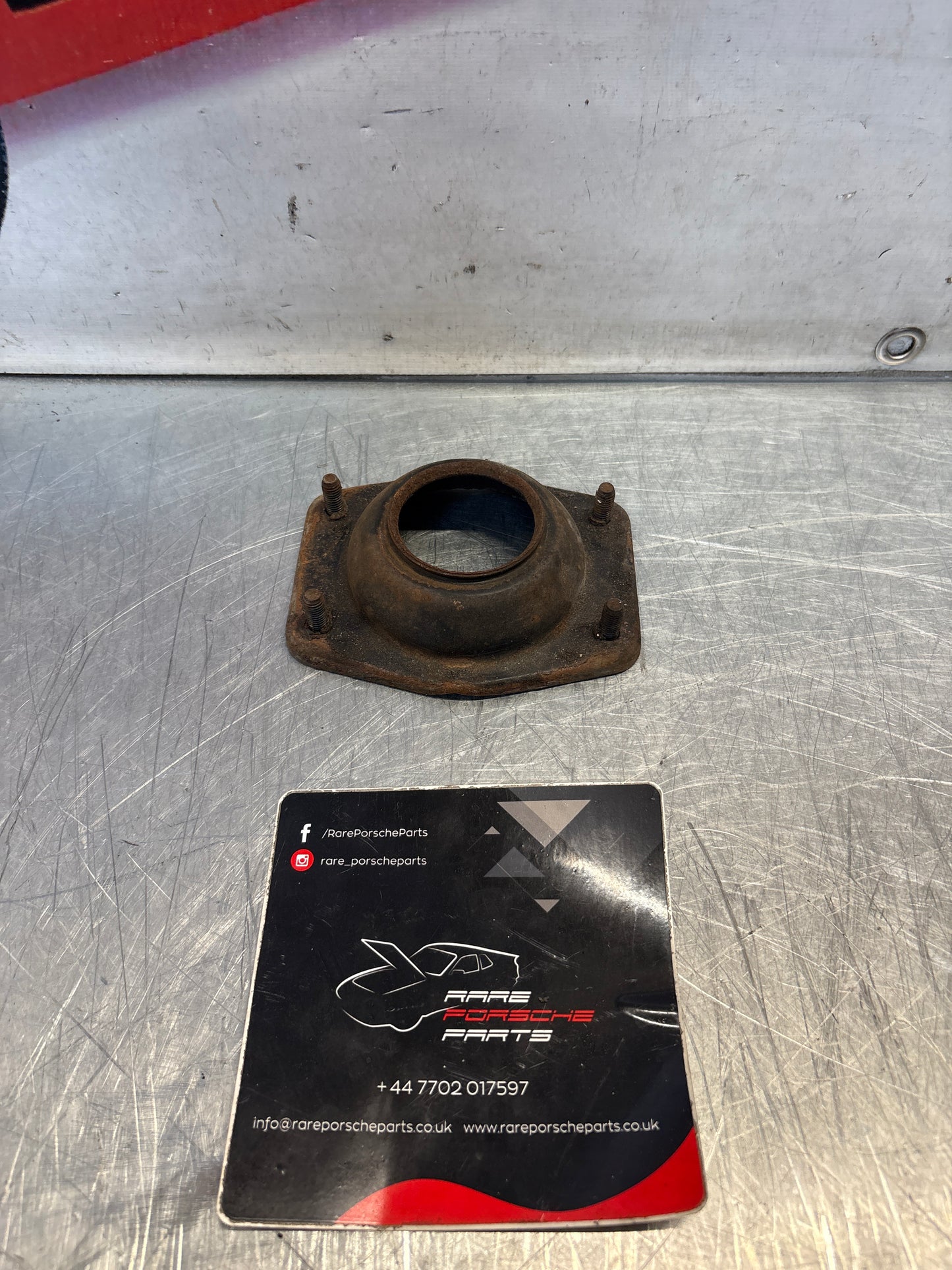 Porsche 924 / 944 front suspension bearing flange, 477412345, used