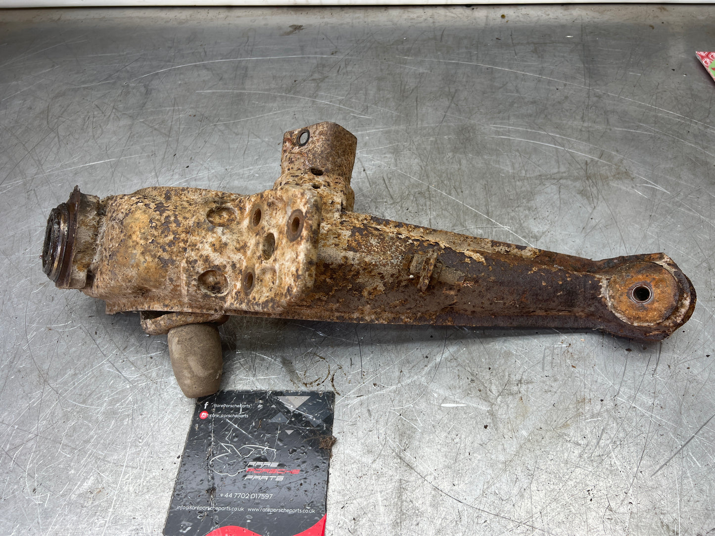 Porsche 924 944  -85.5 Rear left trailing arm, 94433102100