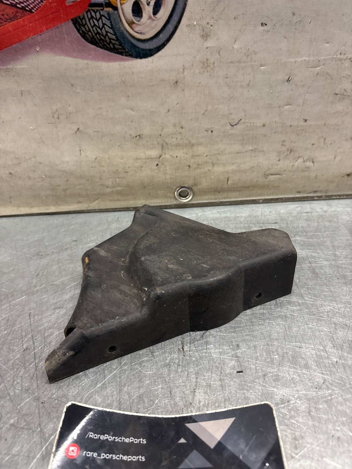 Porsche 914 headlight motor protective plate, right side, used 91475019610