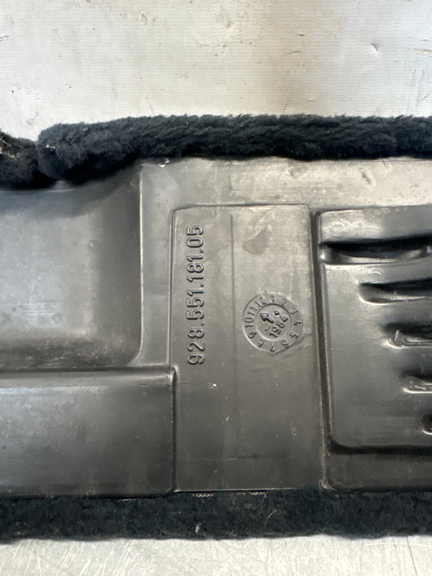 Porsche 928 greyish blue carpeted Tool kit panel cover, used 92855118105