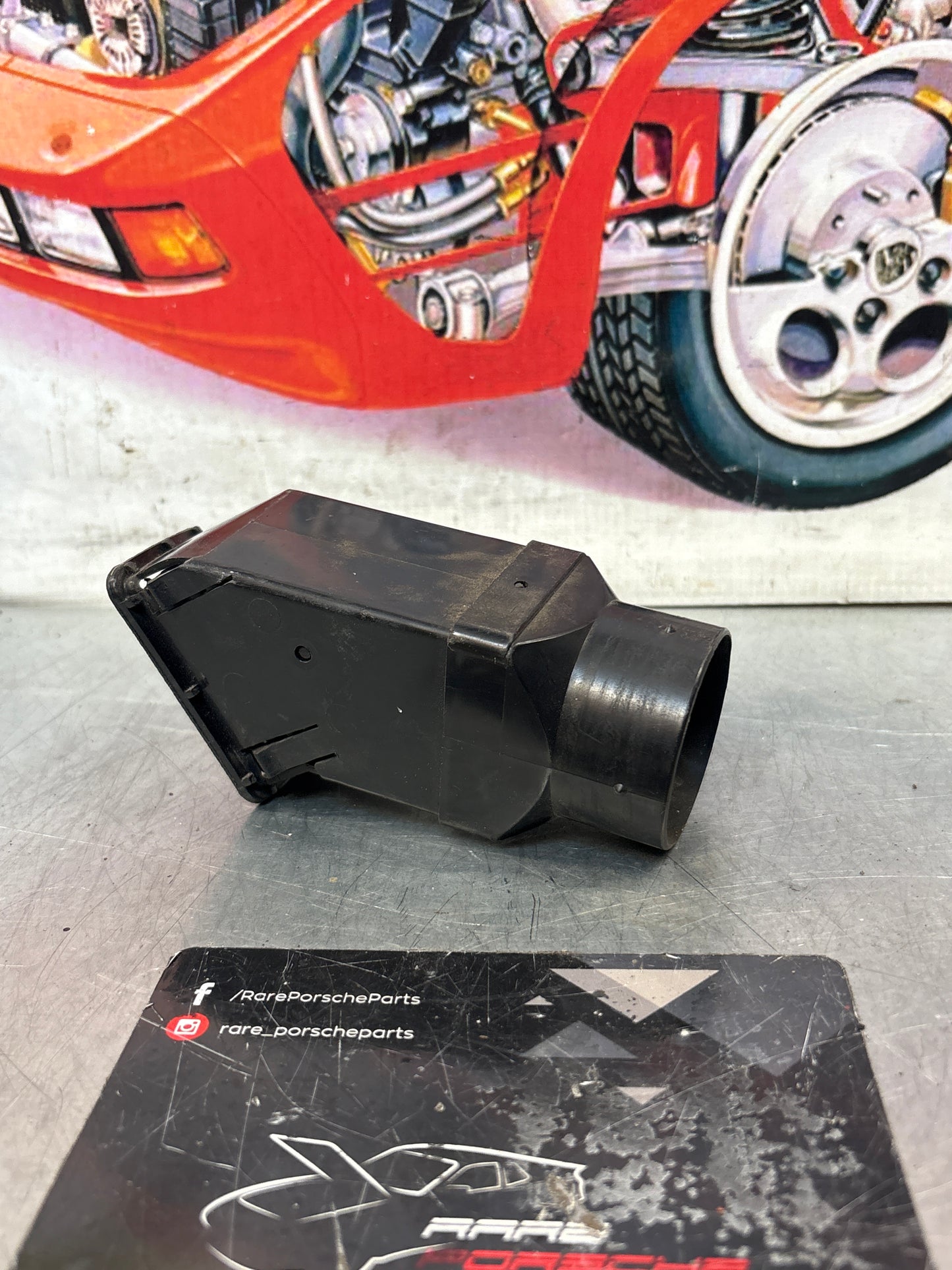 Porsche 924/944 Black dash air vent. left hand, with connecting piece 477819231 / 477819717 used