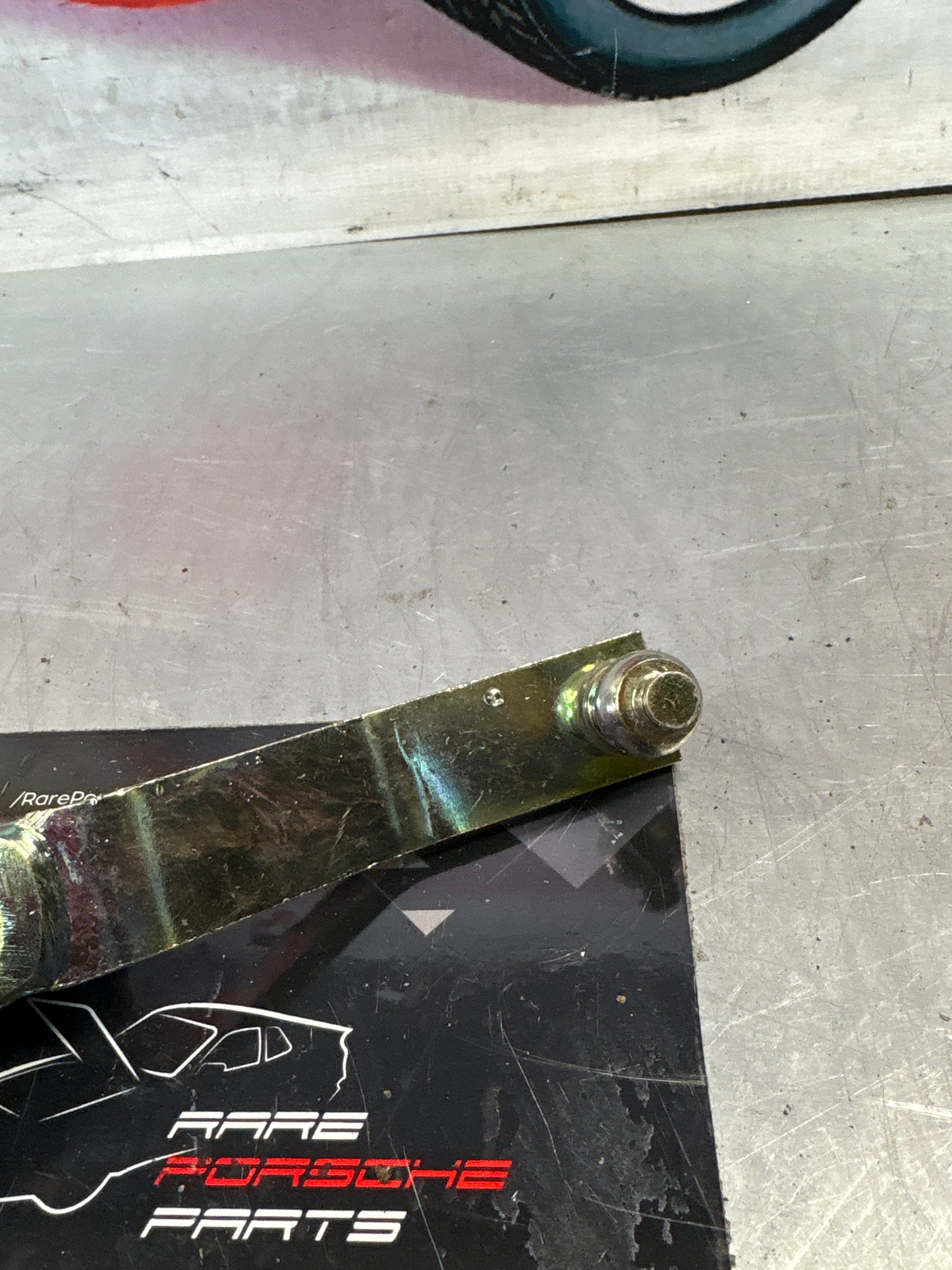 Porsche 924/944 headlight lever, refurbished 477805651