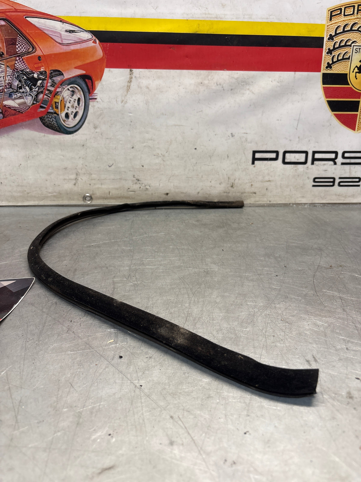 Porsche 928 left door inner window scrapper seal, used 92853731903