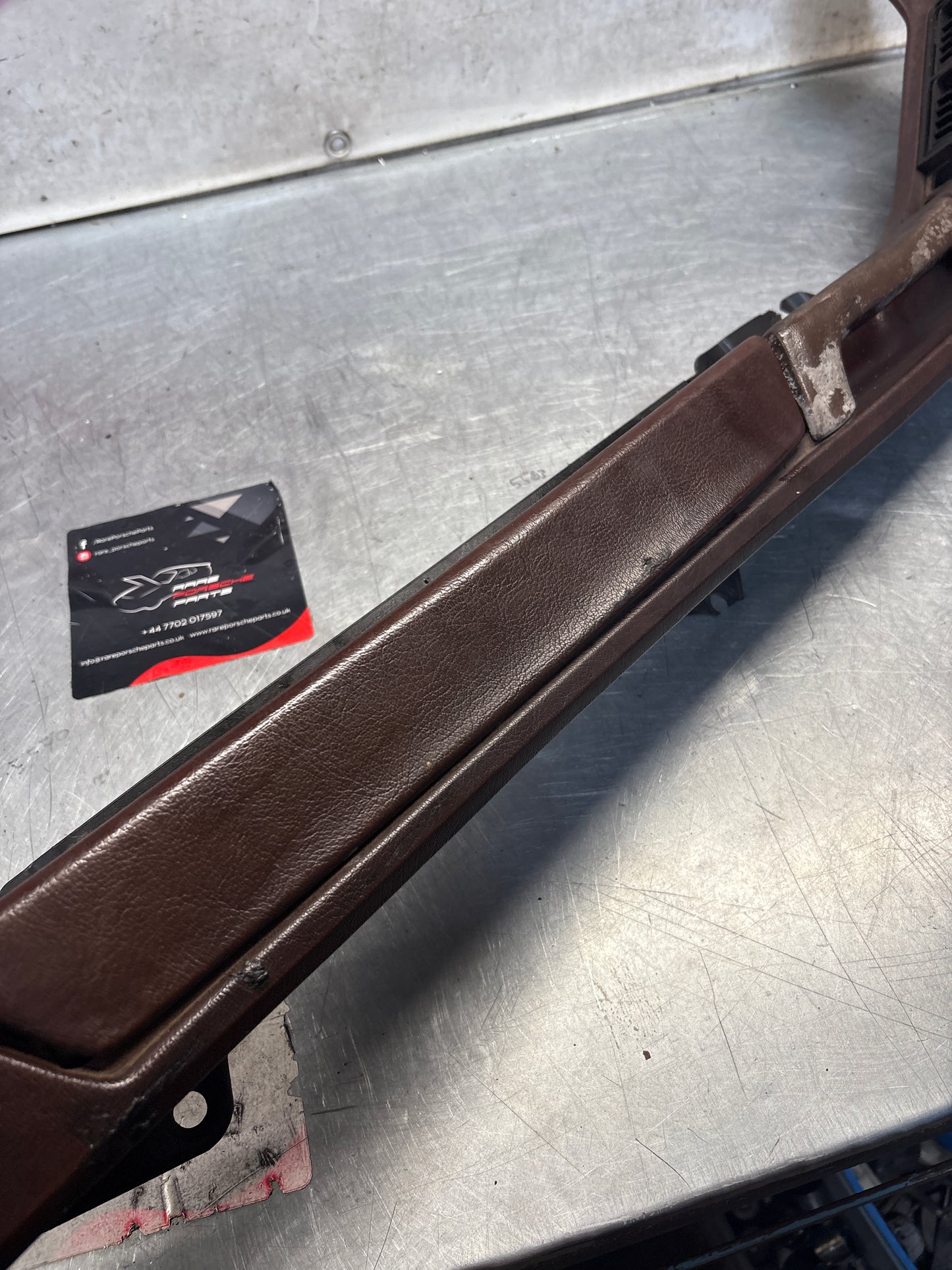 Porsche 928 burgundy door armrest, left, off side, 92855510103, used