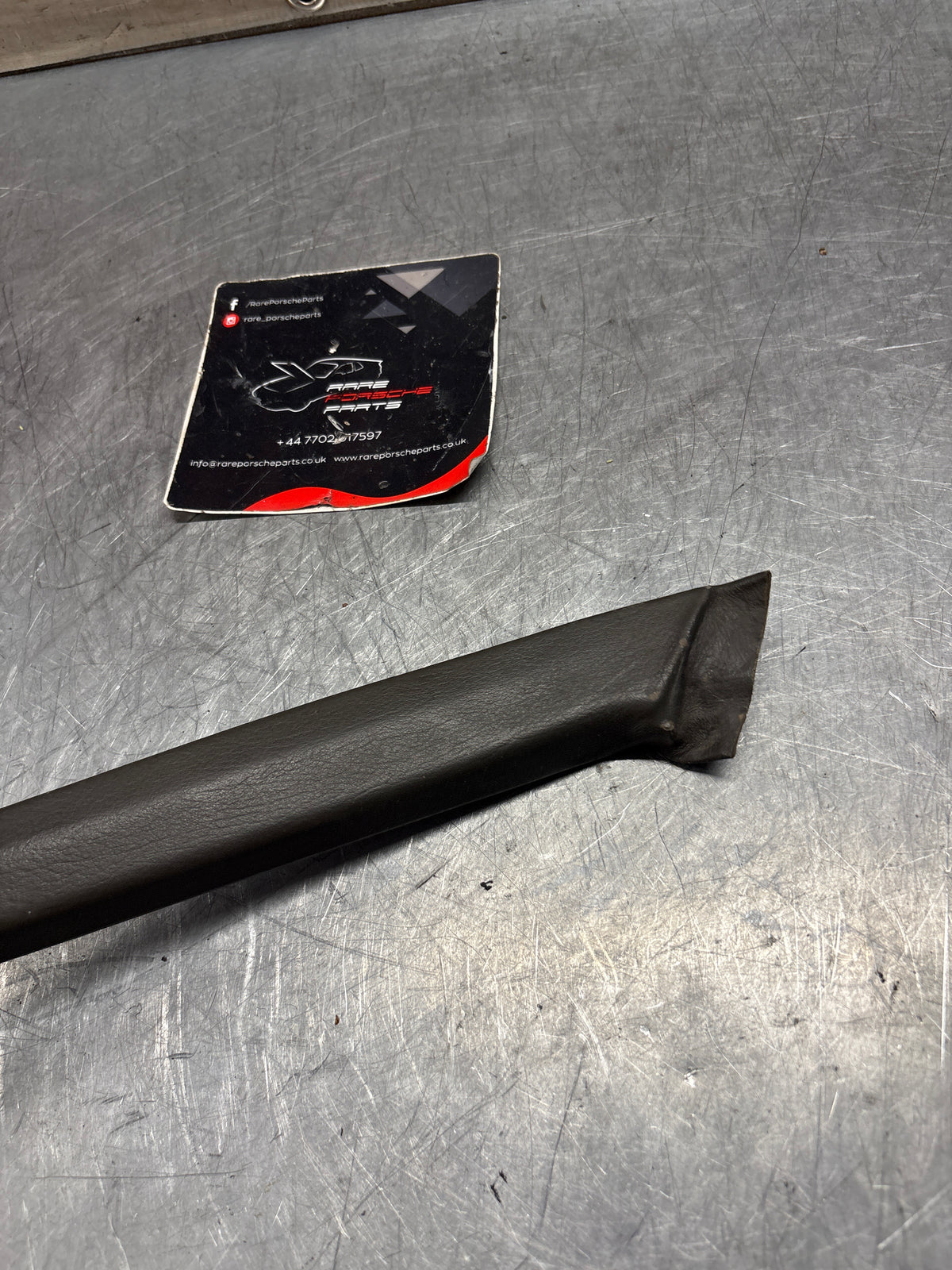 Porsche 928 left, off side door upper frame surround trim, grey 92855502502, used
