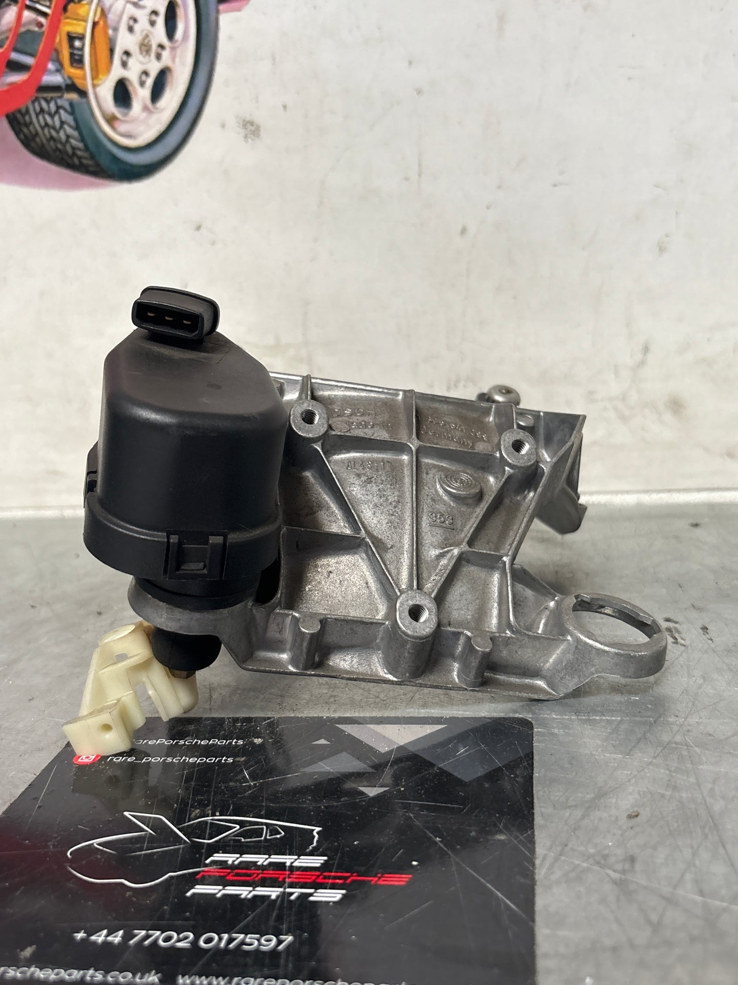 Porsche 968 headlight bracket housing, left 1305541099