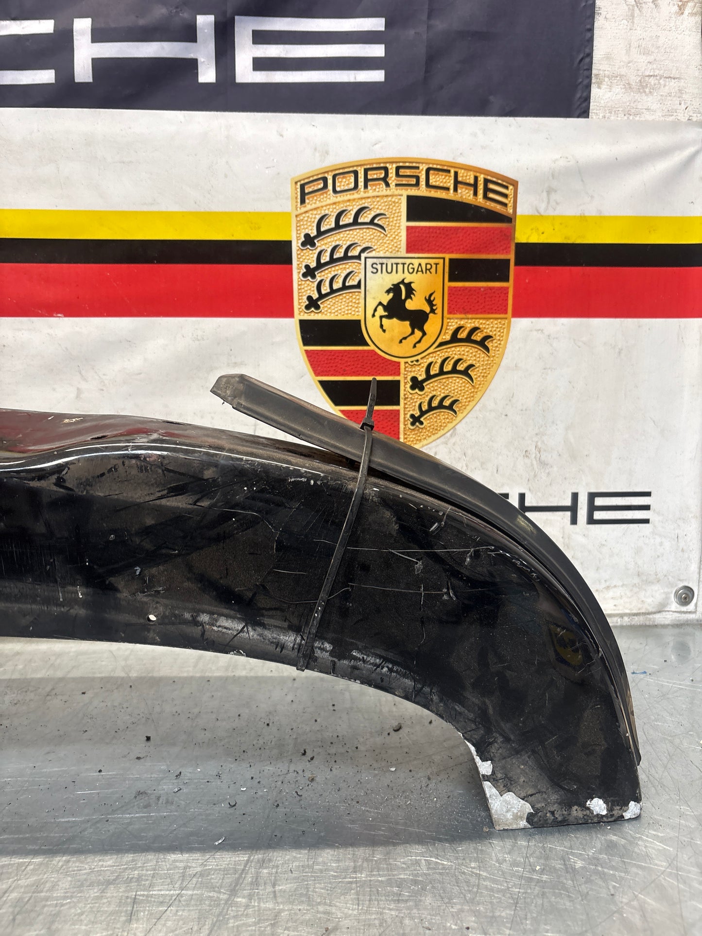 Porsche 911 930 rear bumper with skirt, used 93050511201