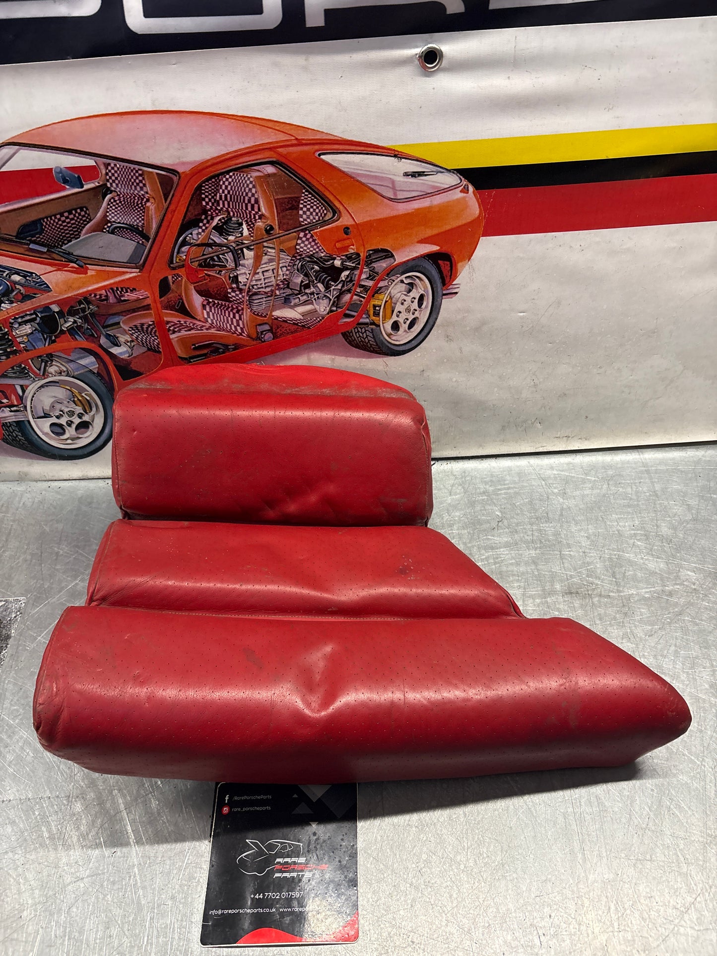 Porsche 928 rear left seat and center cushion, used, can-can red 92852205951 / 92852208751