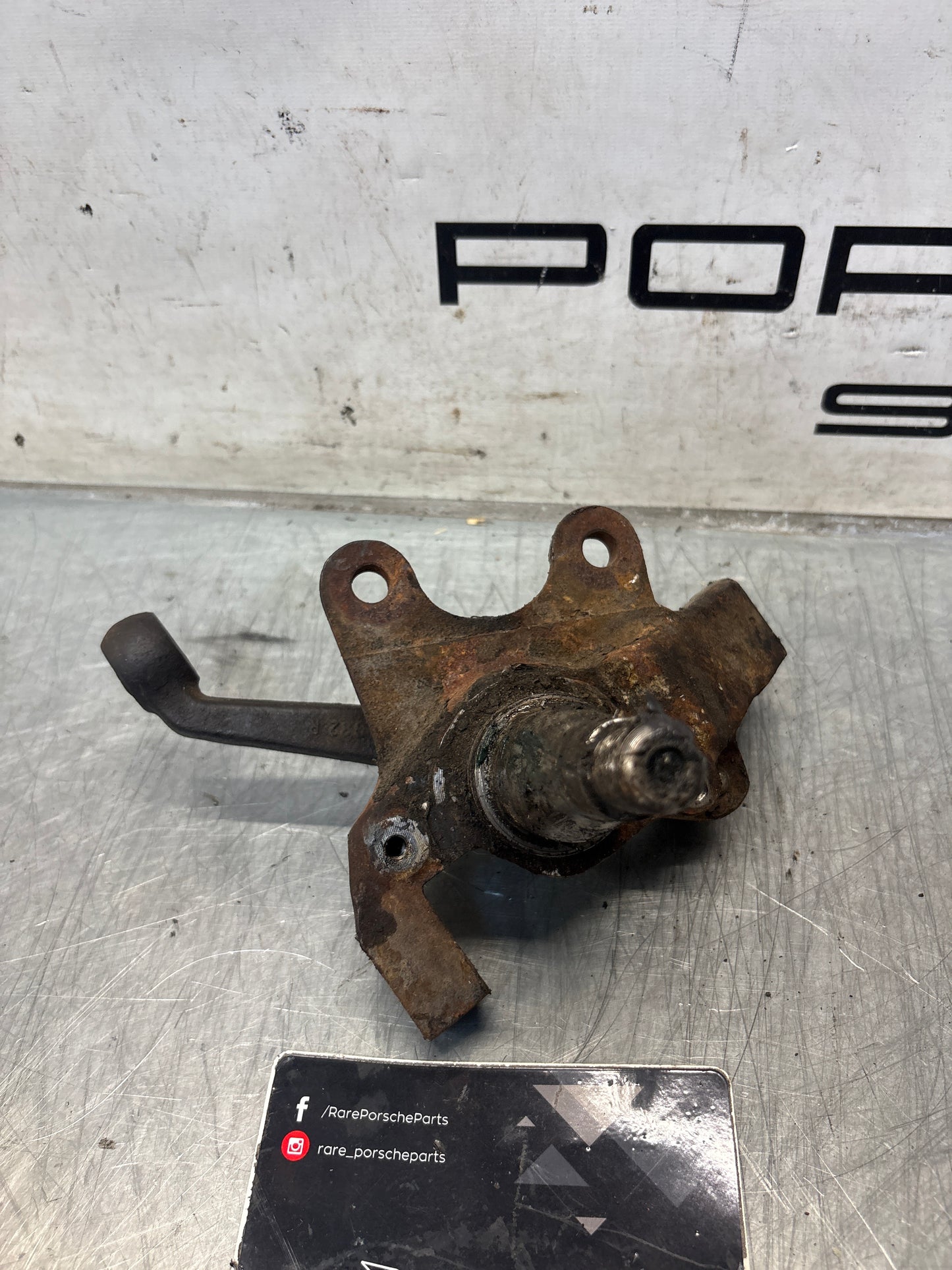 Porsche 928 right steering spindle knuckle, used 92834105803
