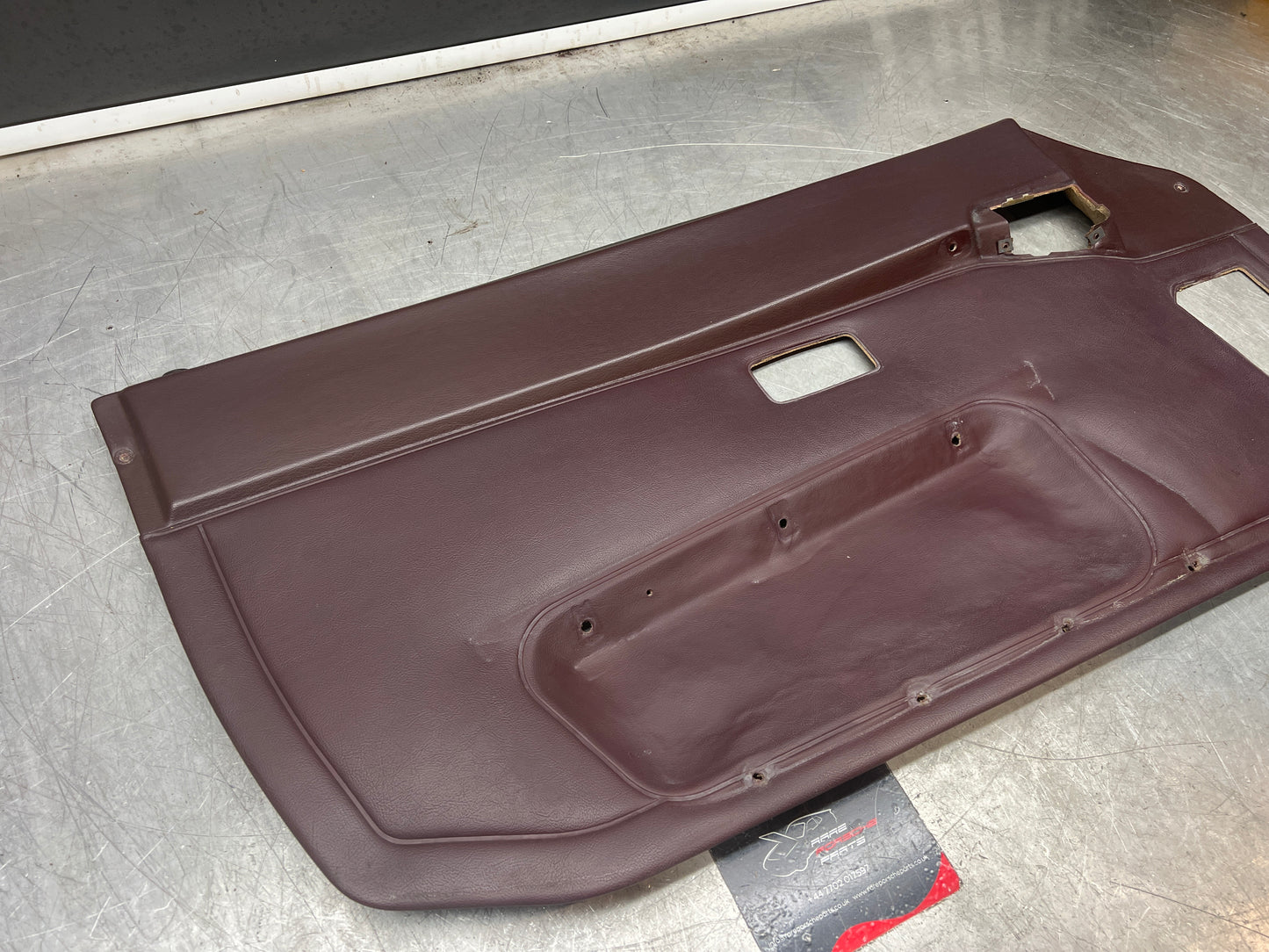 Porsche 944 left burgundy  door card for late cars from 85.5 944555017
