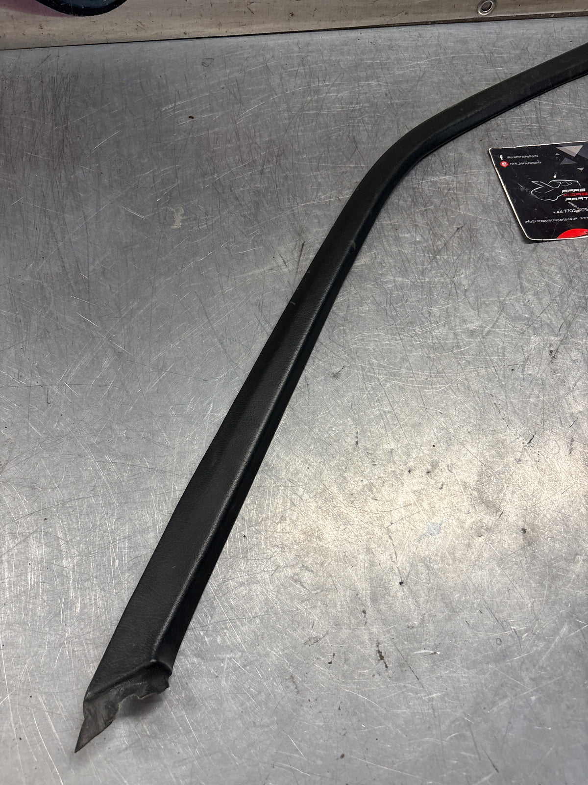 Porsche 928 right, off side door upper frame surround trim, green 92855502602, used