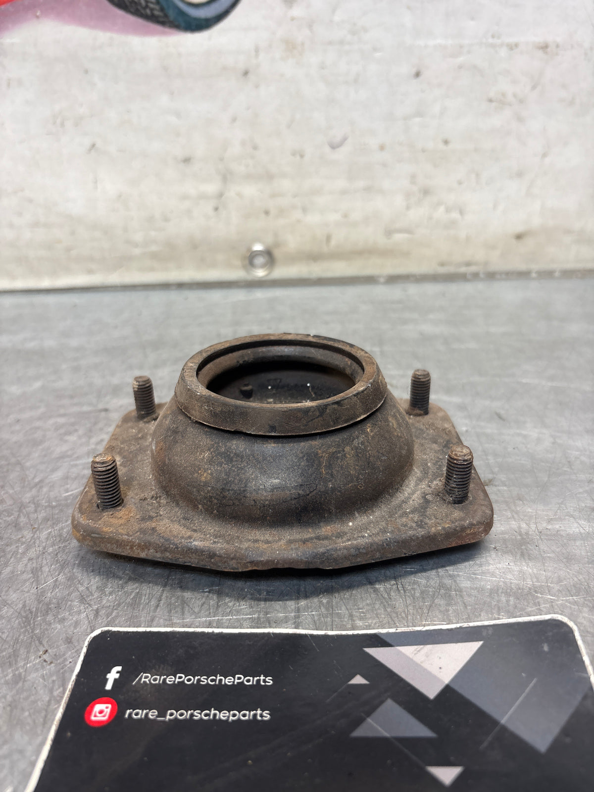 Porsche 924 / 944 front suspension bearing flange, 477412345, used