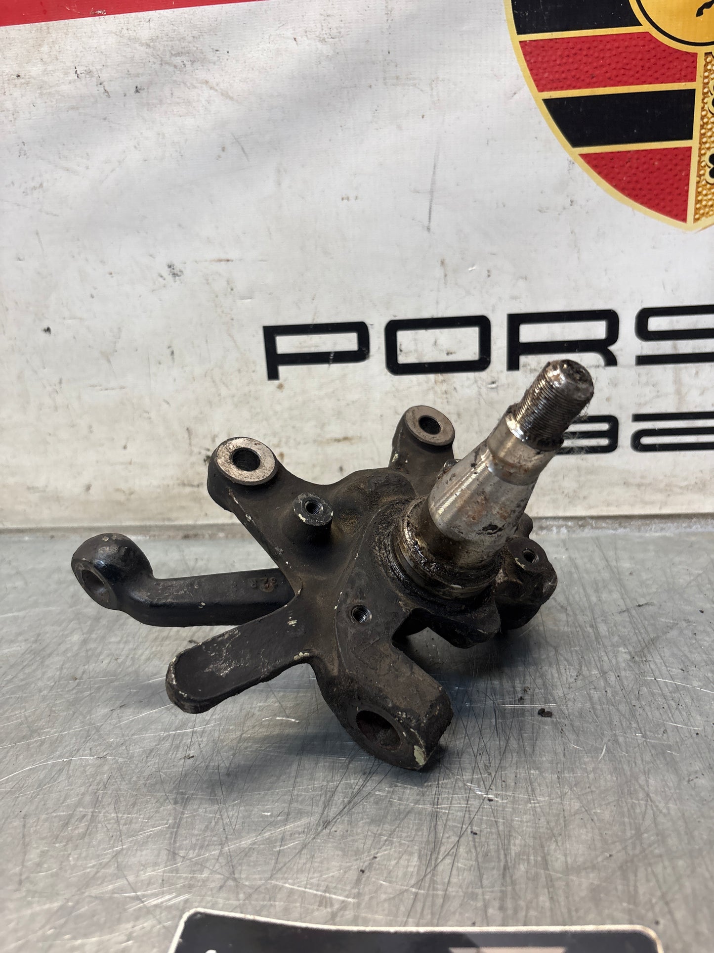 Porsche 928 right steering spindle knuckle, used 92834105817