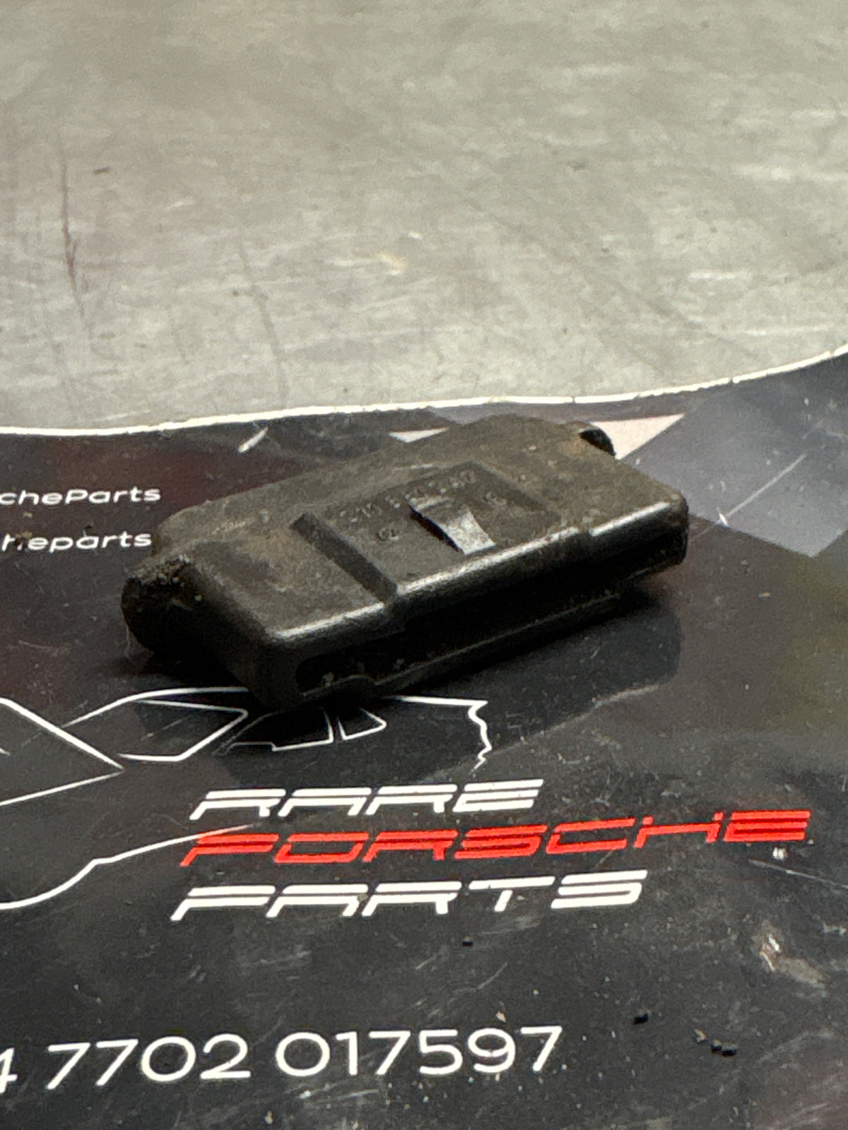 Porsche 914 seat rail end plug, used 311881347
